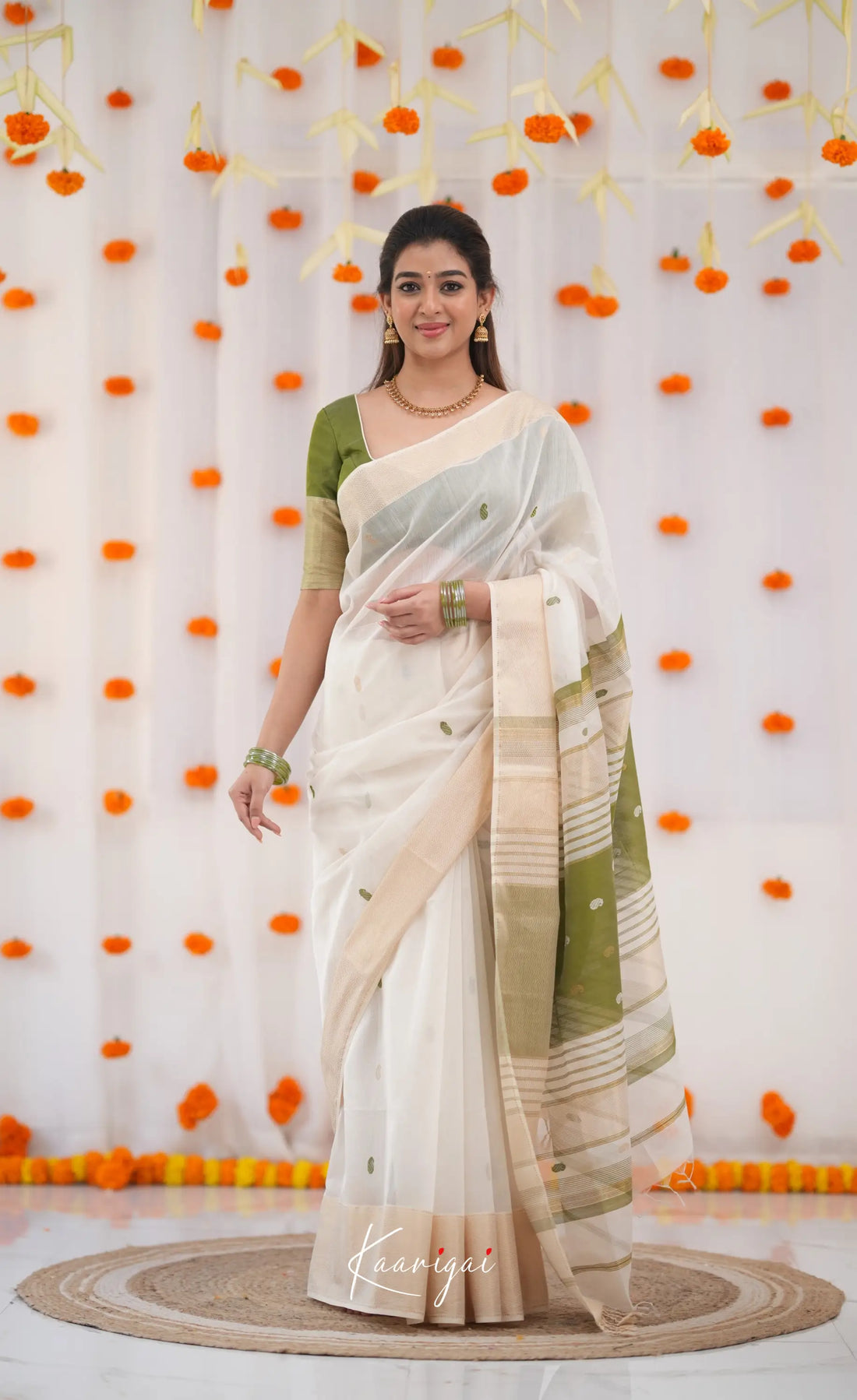 Maanvi Maheswari Silk Cotton Saree - White and Olive Green Sarees