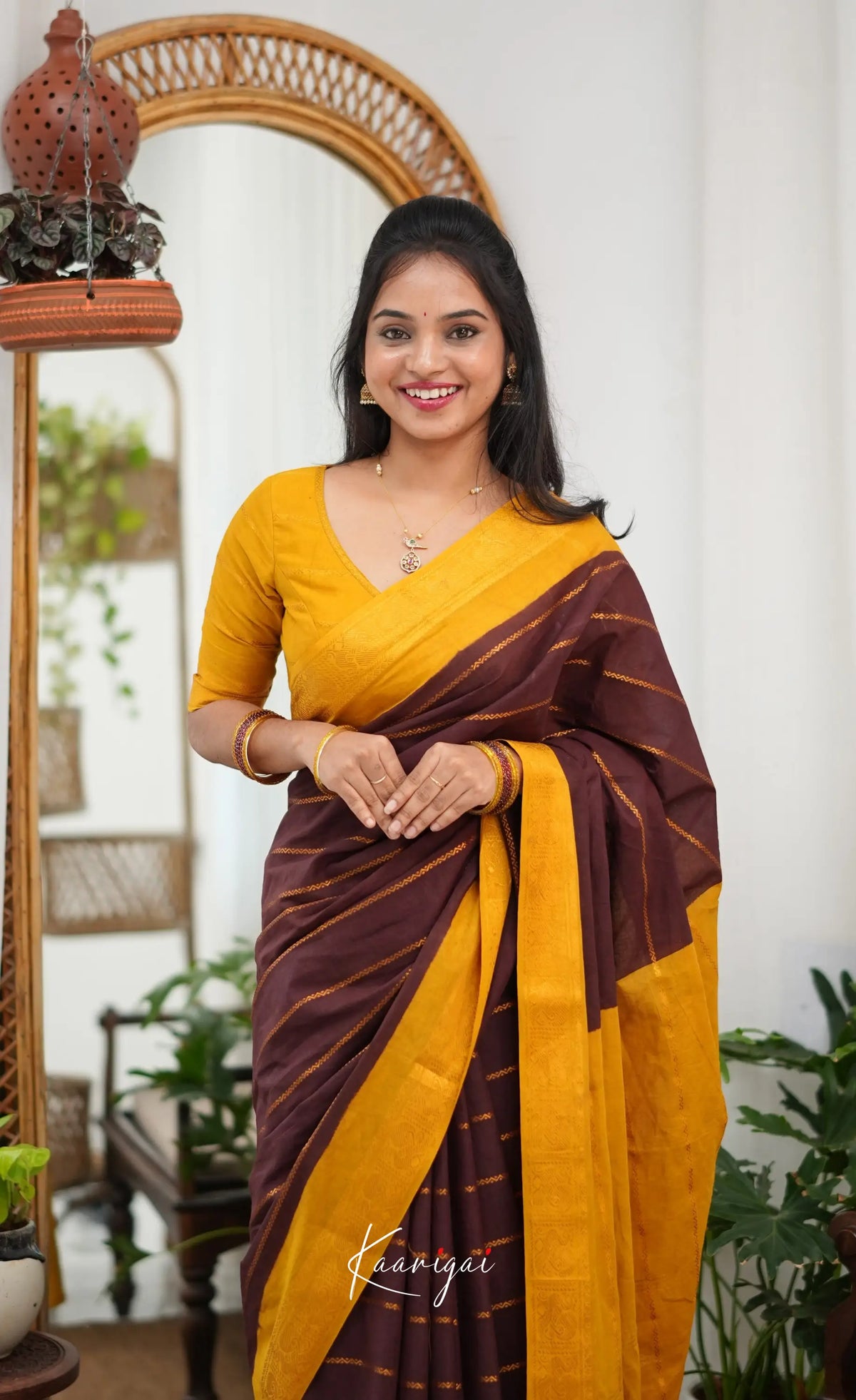 Saaral - Dark brown and Henna yellow Sungudi Saree - Sarees