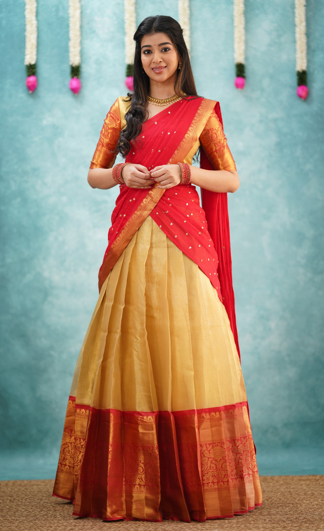 Izhaiyini Shade of Red and Gold tone Organza Halfsaree (Express Delivery)