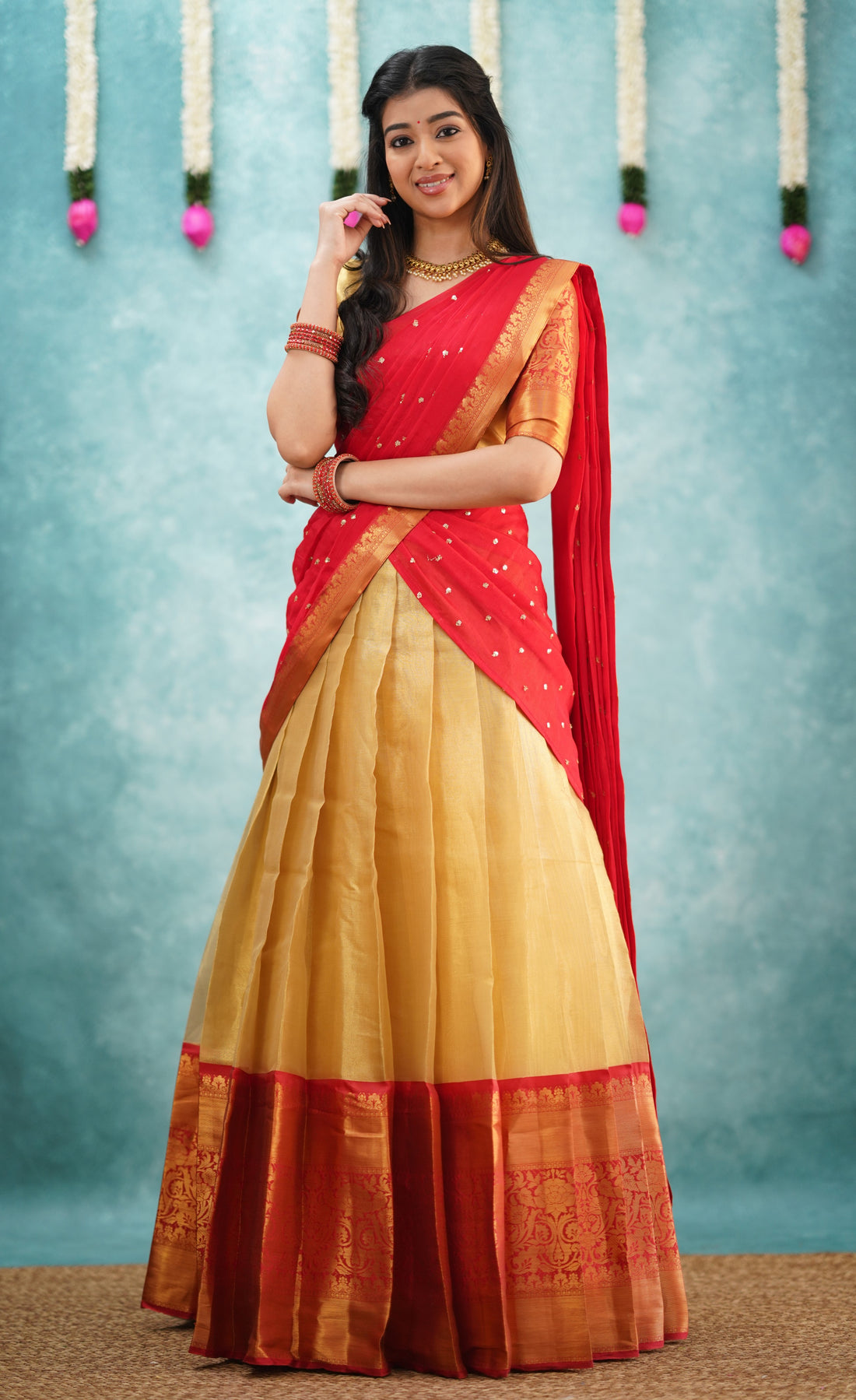 Izhaiyini Shade of Red and Gold tone Organza Halfsaree (Express Delivery)