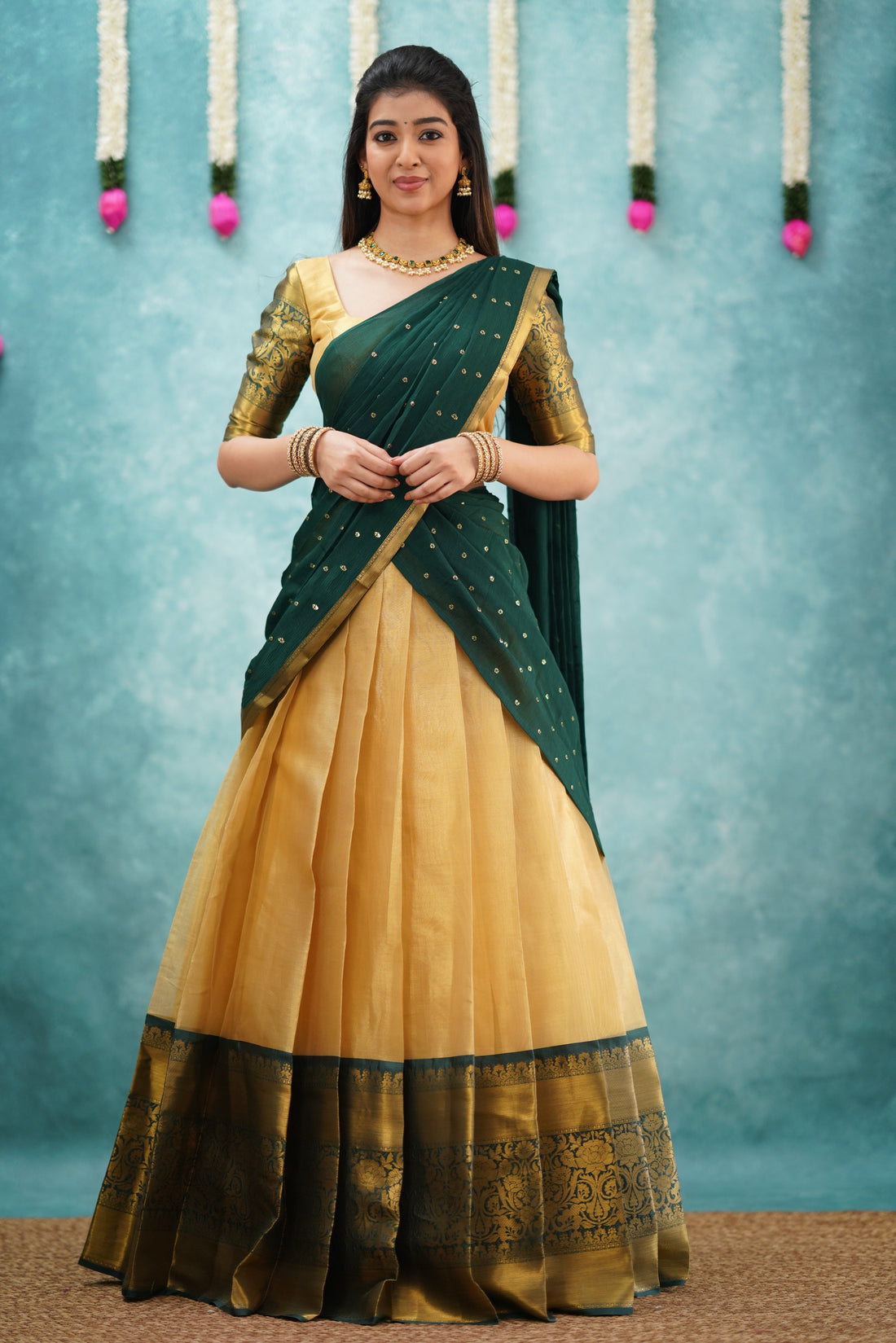 Izhaiyini Dark Bottle Green Shade and Gold tone Organza Halfsaree