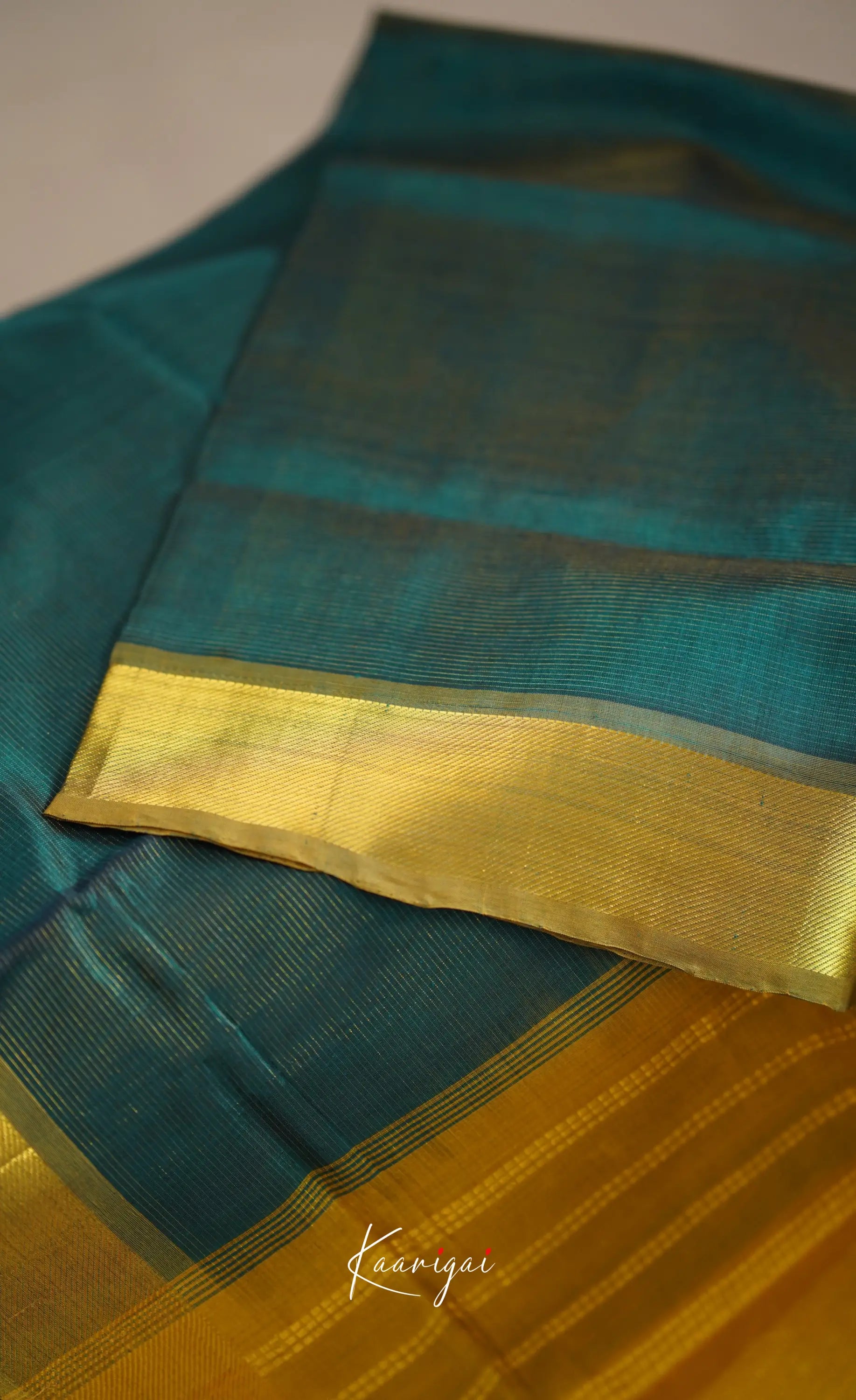 Chaarvi- Deep Bottle Green With Mustard Kanchi Silk Cotton Saree Sarees