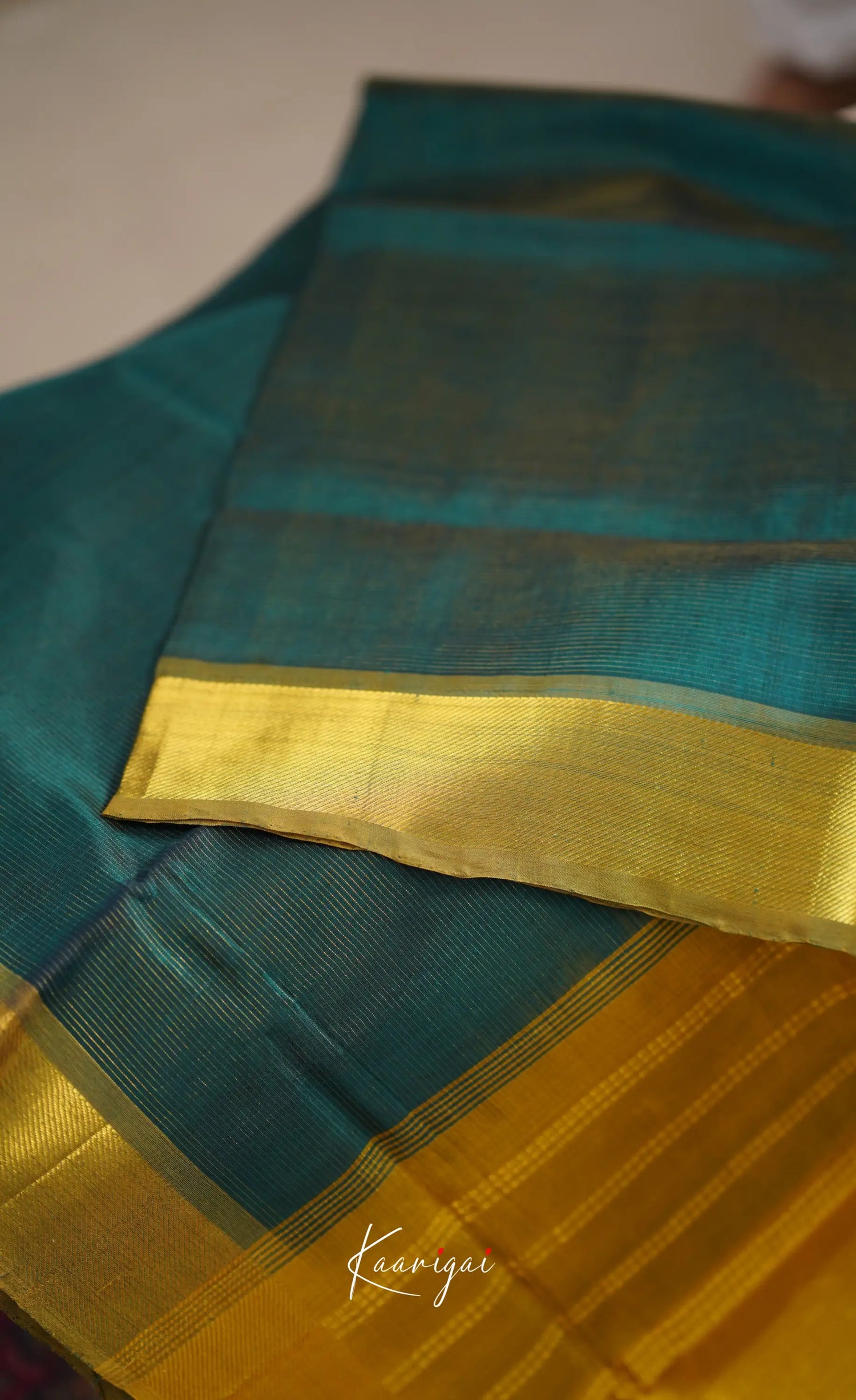 Chaarvi- Deep Bottle Green With Mustard Kanchi Silk Cotton Saree Sarees