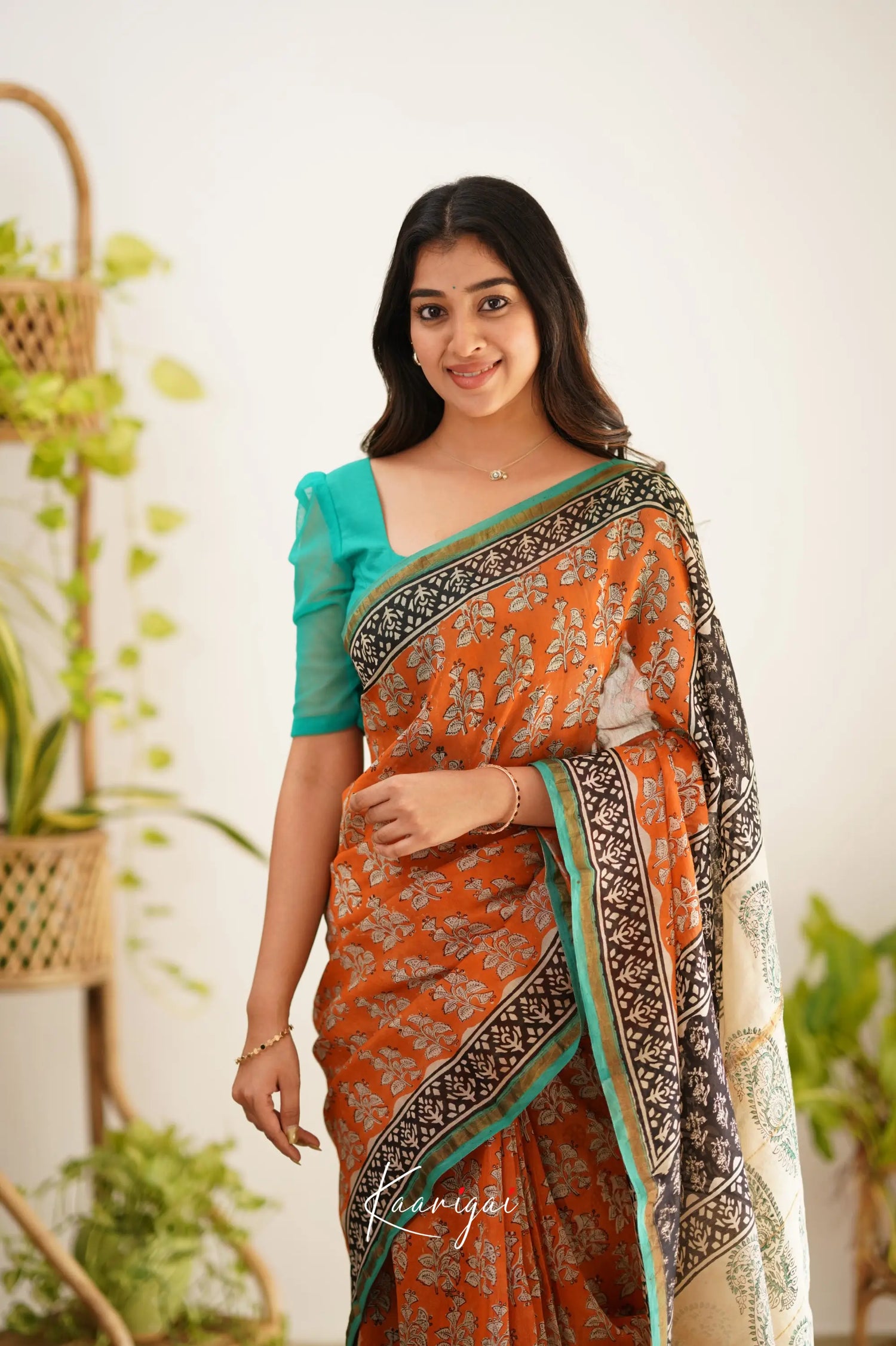 Chaavi Chanderi Saree - Orange And Teal Green Sarees