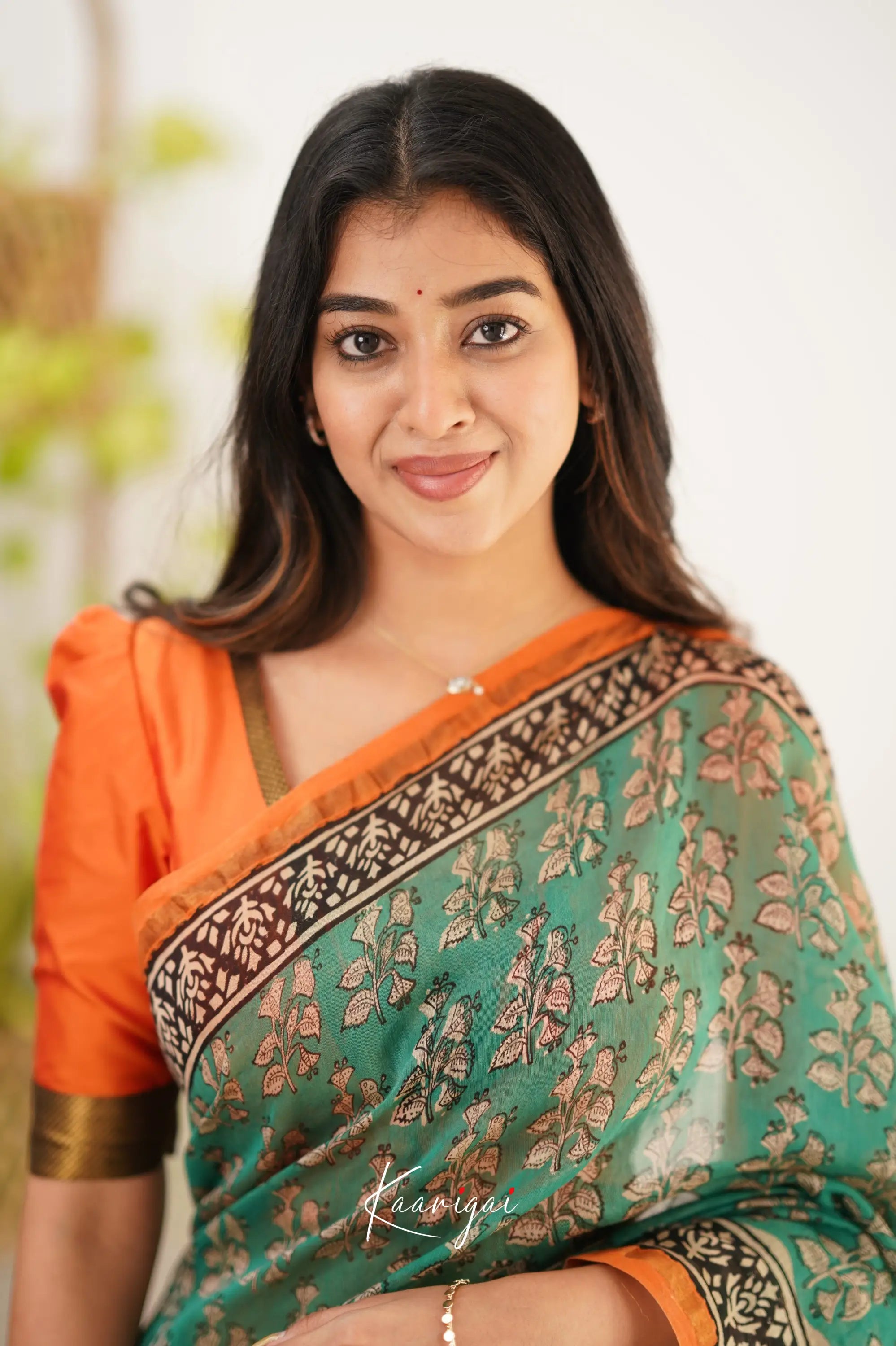 Chaavi Chanderi Saree - Teal Green And Orange Sarees