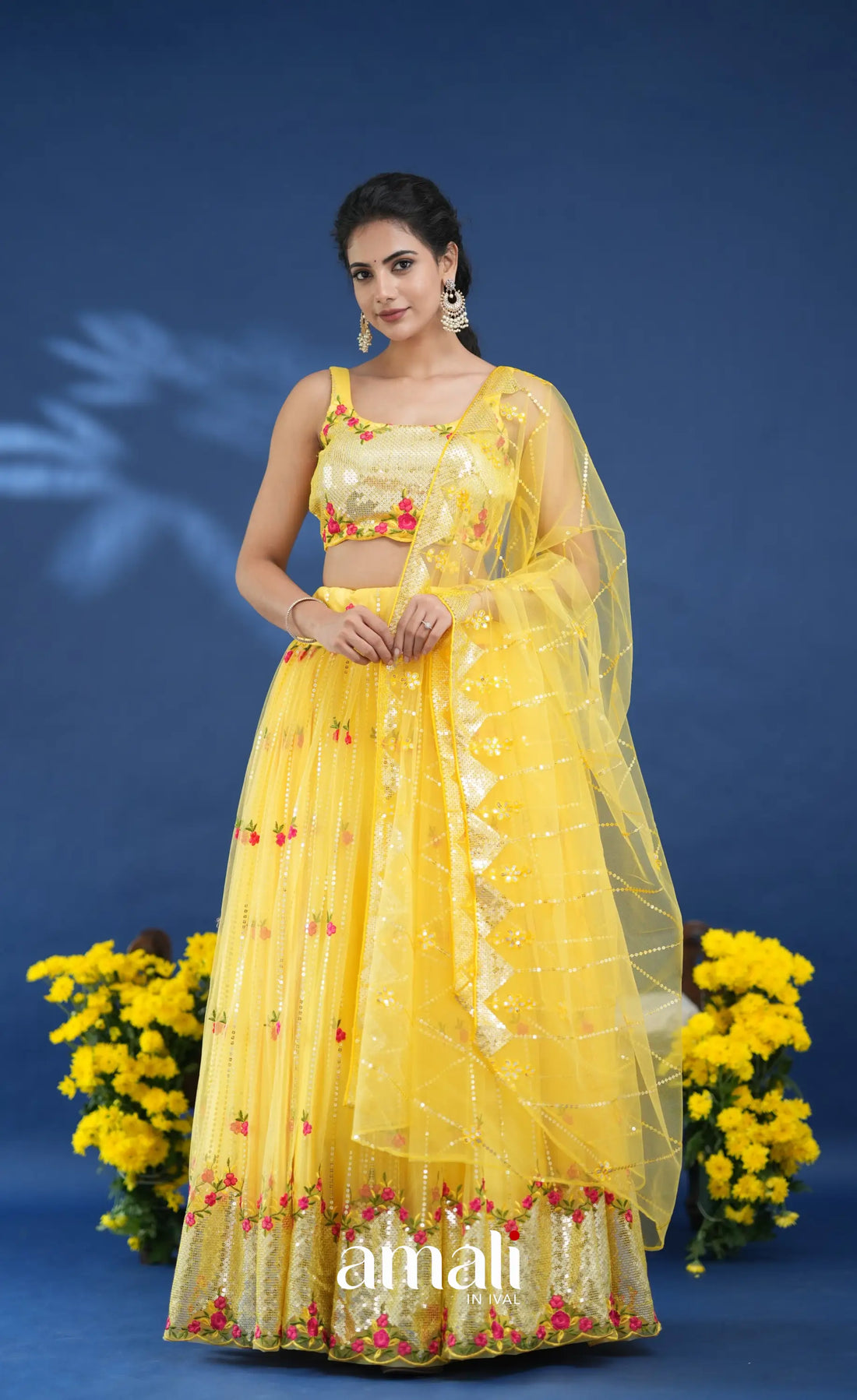 Coral Yellow Net Lehenga crop top and skirts