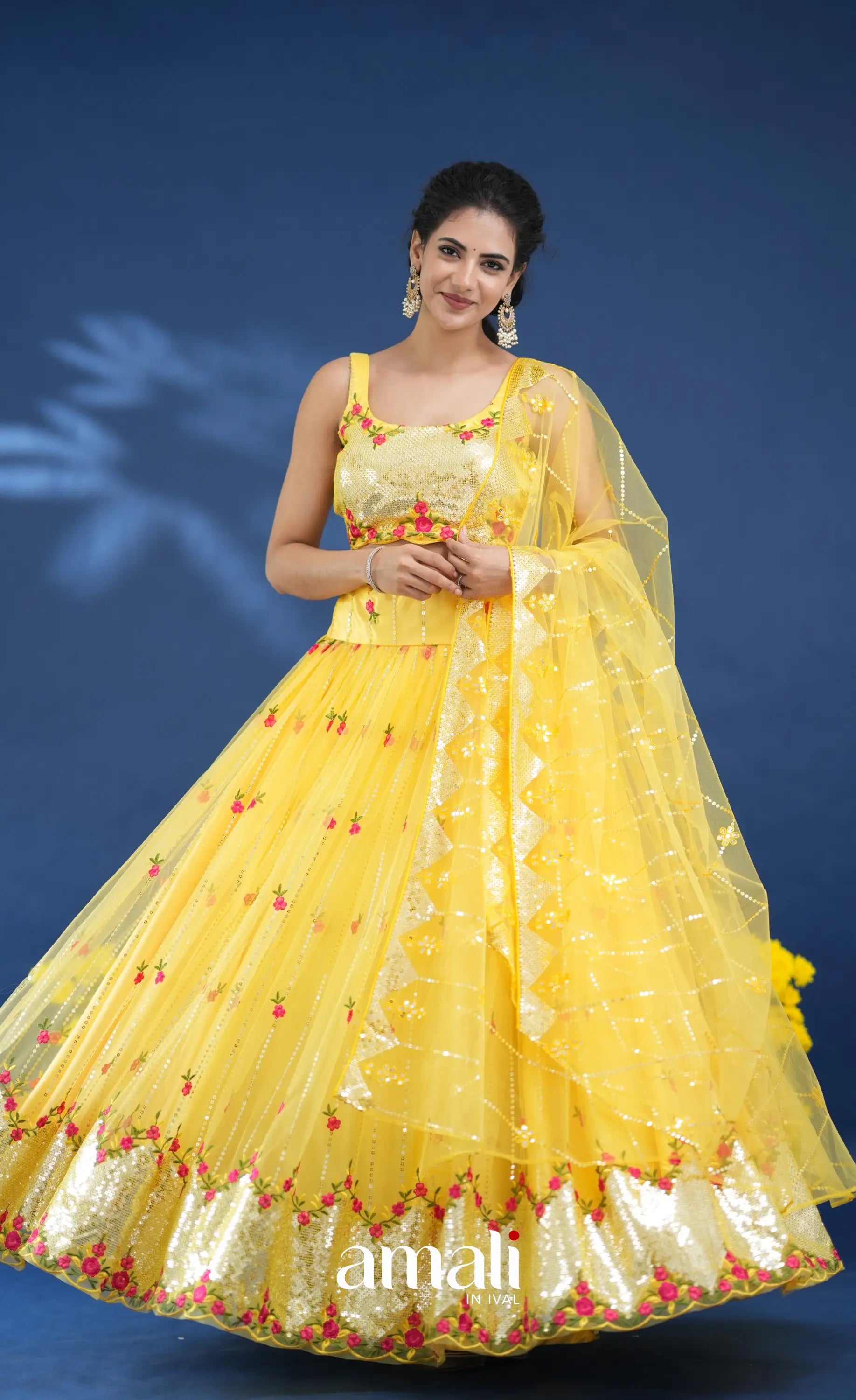 Coral Yellow Net Lehenga crop top and skirts