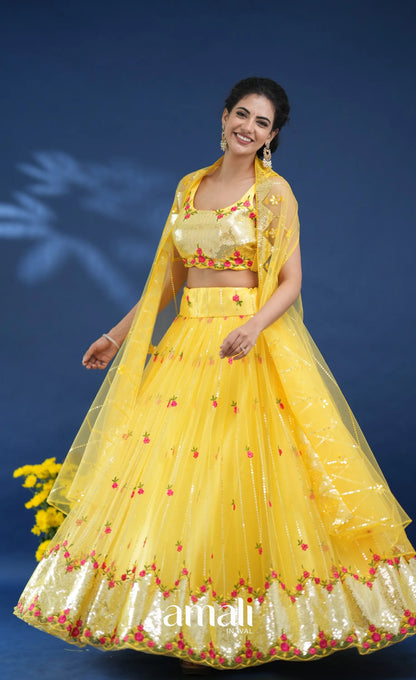Coral Yellow Net Lehenga crop top and skirts