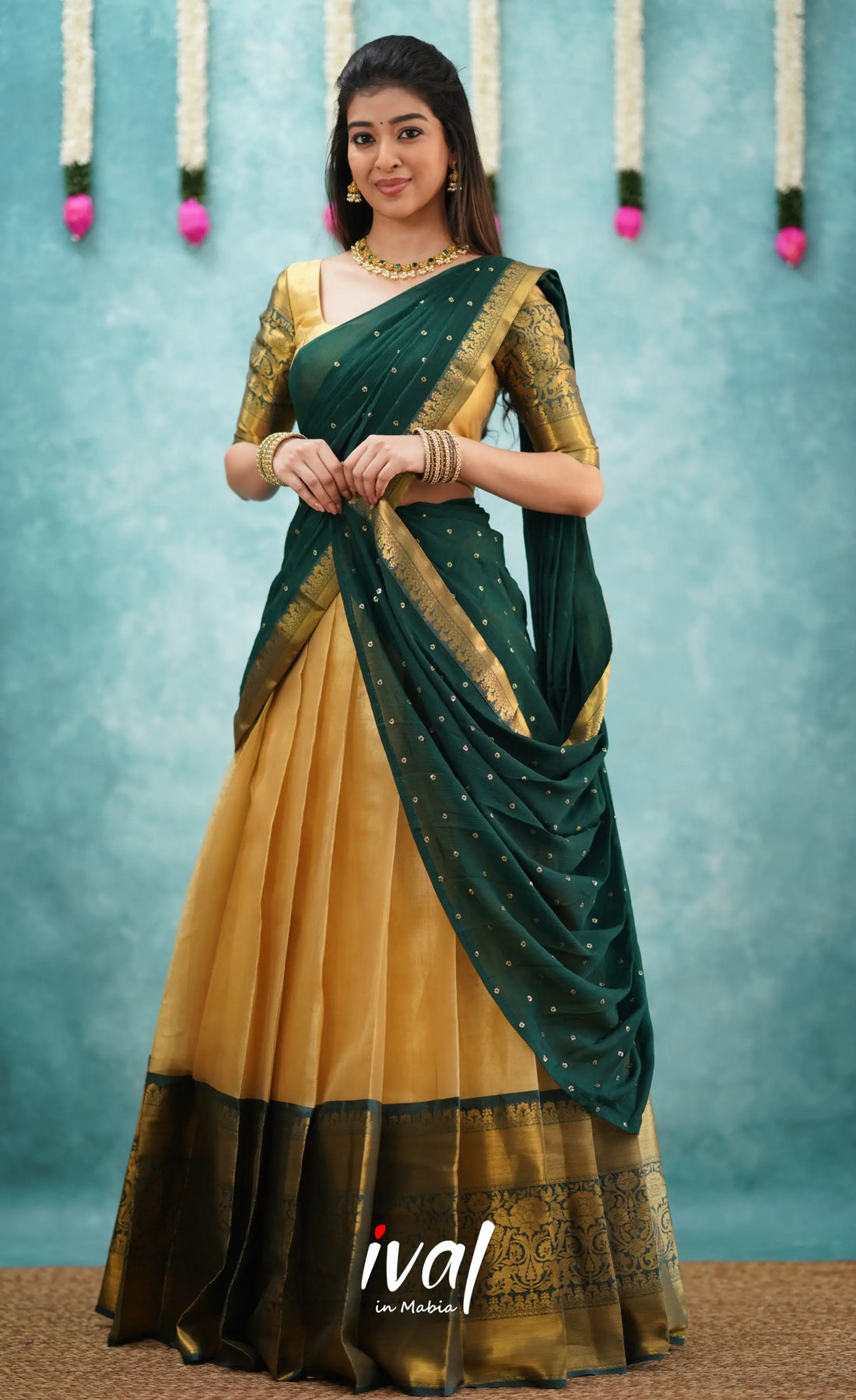 Izhaiyini Dark Bottle Green Shade And Gold Tone Organza Halfsaree Half Sarees