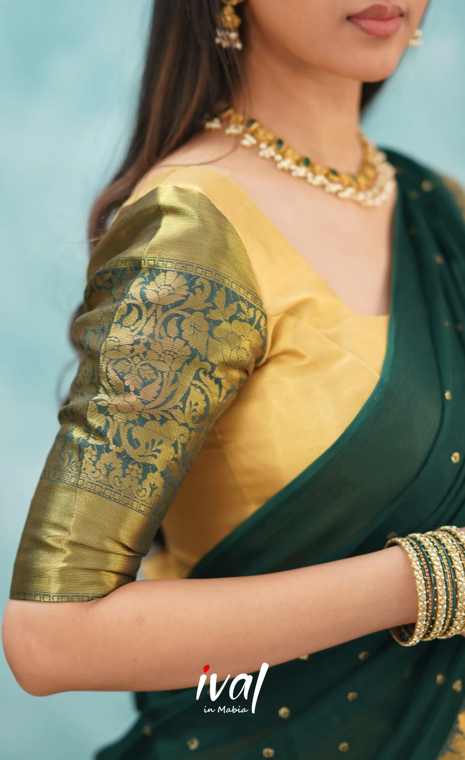 Izhaiyini Dark Bottle Green Shade And Gold Tone Organza Halfsaree Half Sarees