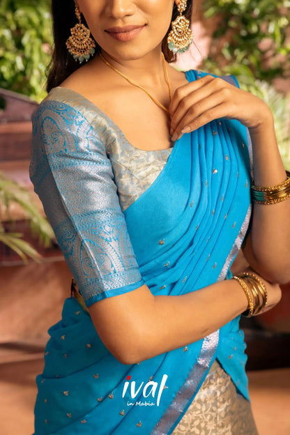 Izhaiyini - Dark Sky Blue Banarasi Tissue Halfsaree Half Sarees