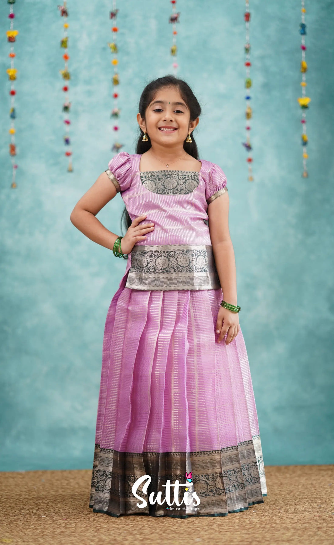 Izhaiyini Light Lavender Shade And Dark Green Tone Organza Pavadai Sattai Kids-Suttis