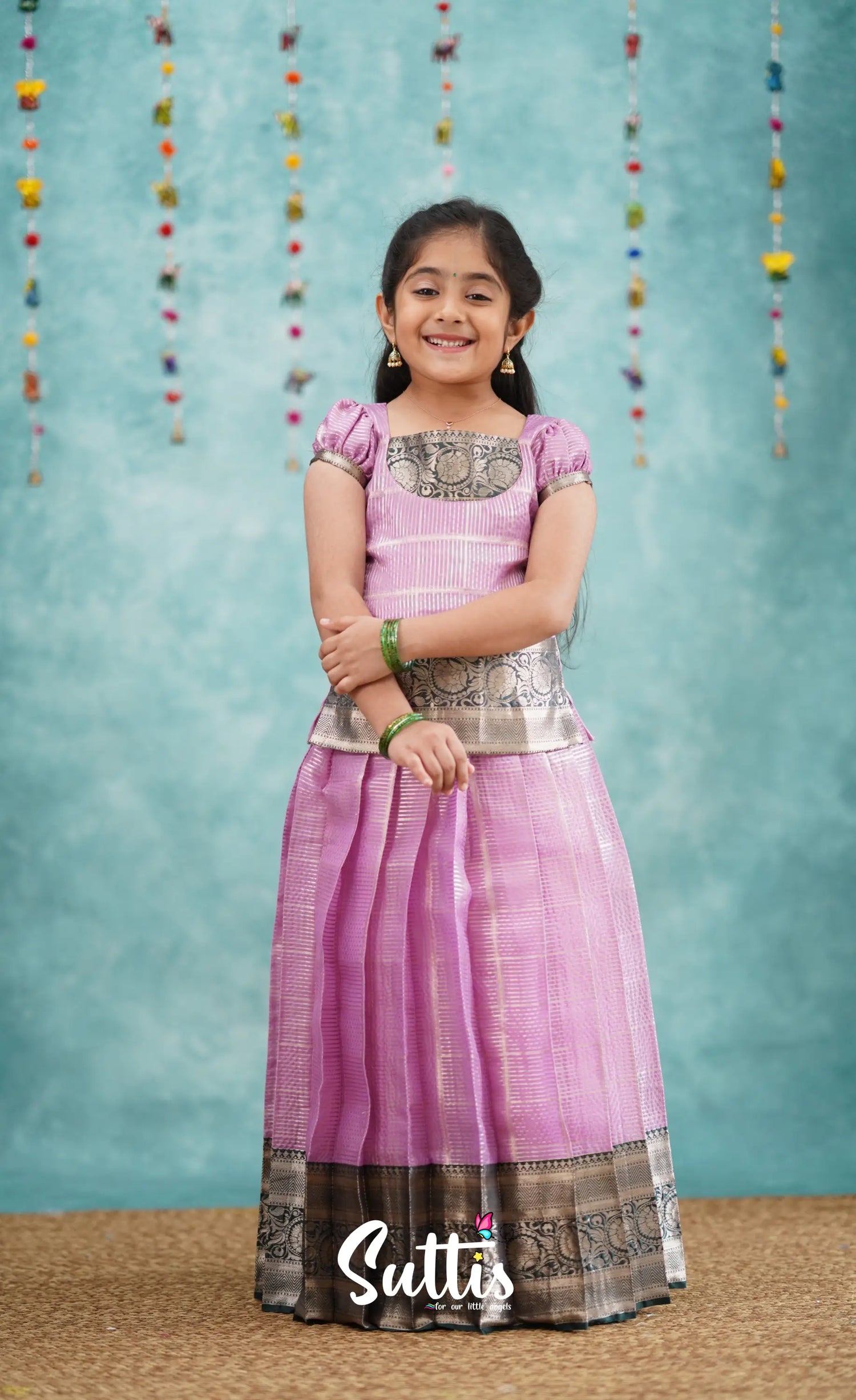 Izhaiyini Light Lavender Shade And Dark Green Tone Organza Pavadai Sattai Kids-Suttis