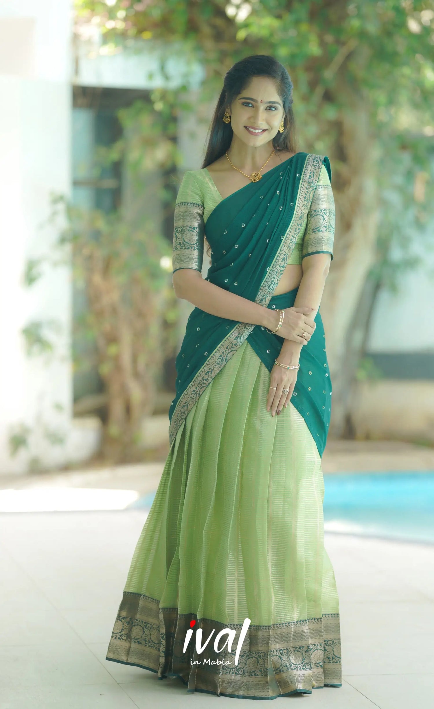 Izhaiyini Organza Halfsaree - Pista Green Half Sarees