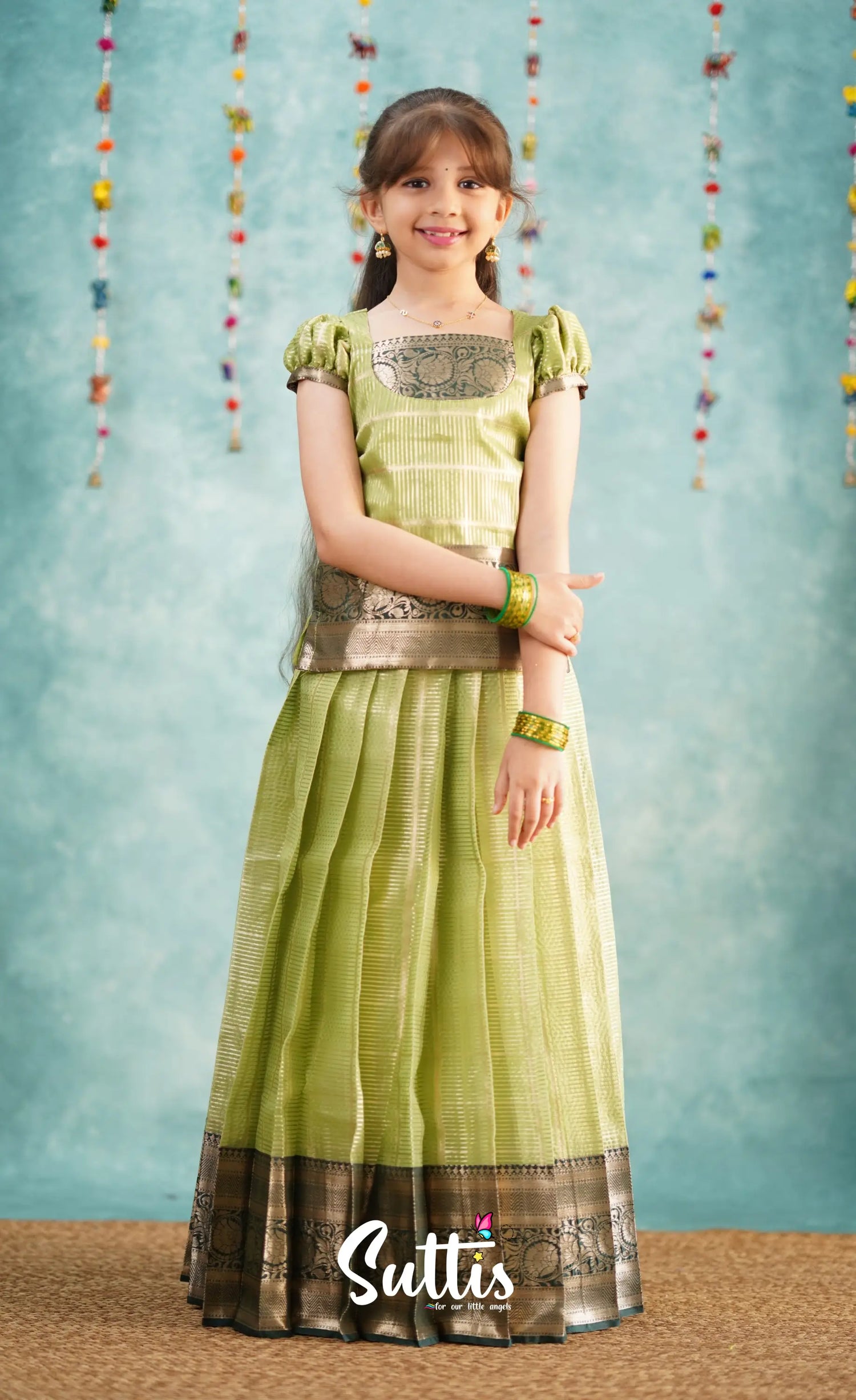 Izhaiyini Pista Green Shade And Dark Tone Organza Pavadai Sattai Kids-Suttis