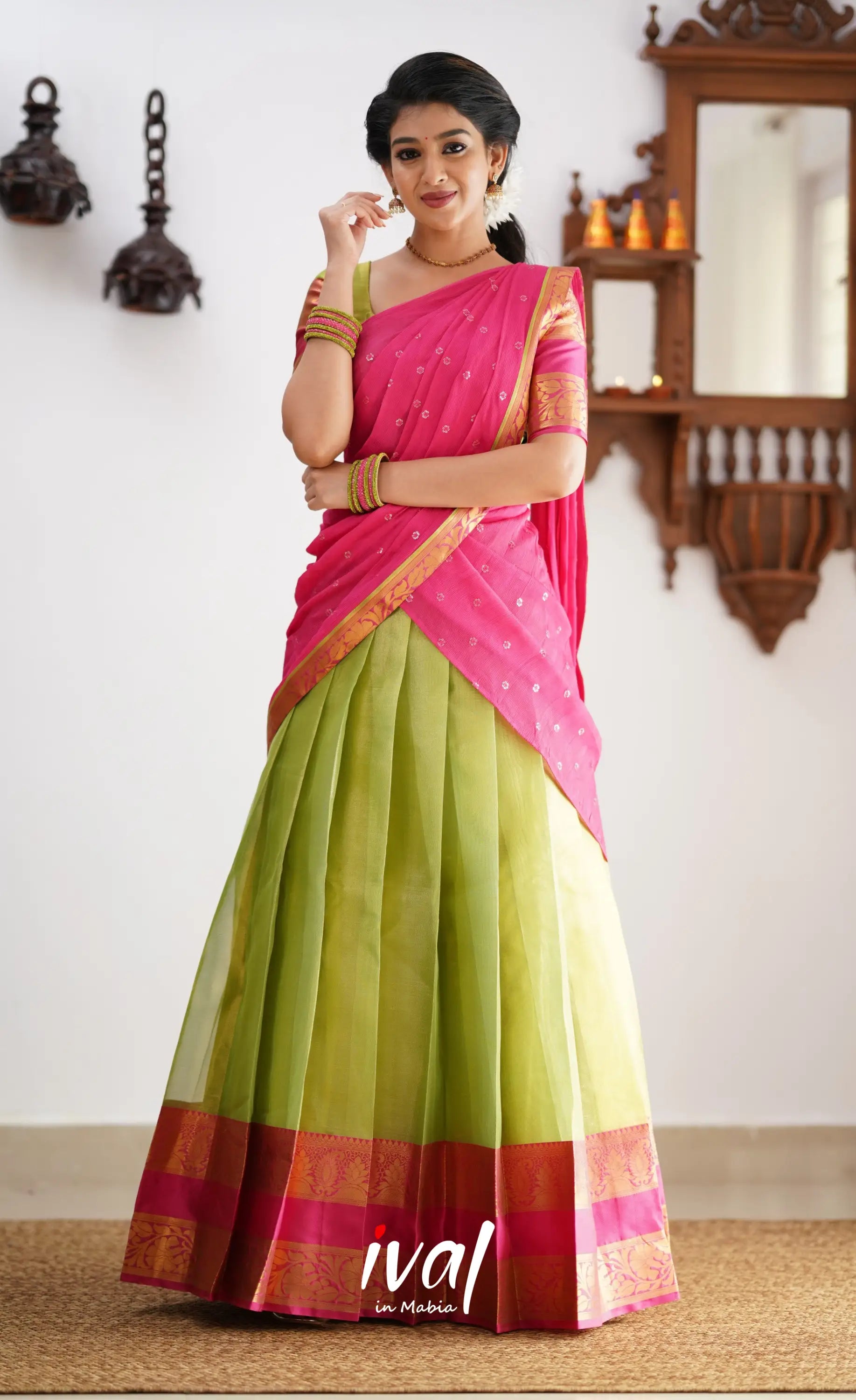 Izhaiyini - Shade Of Green And Hot Pink Tone Organza Halfsaree Half Sarees