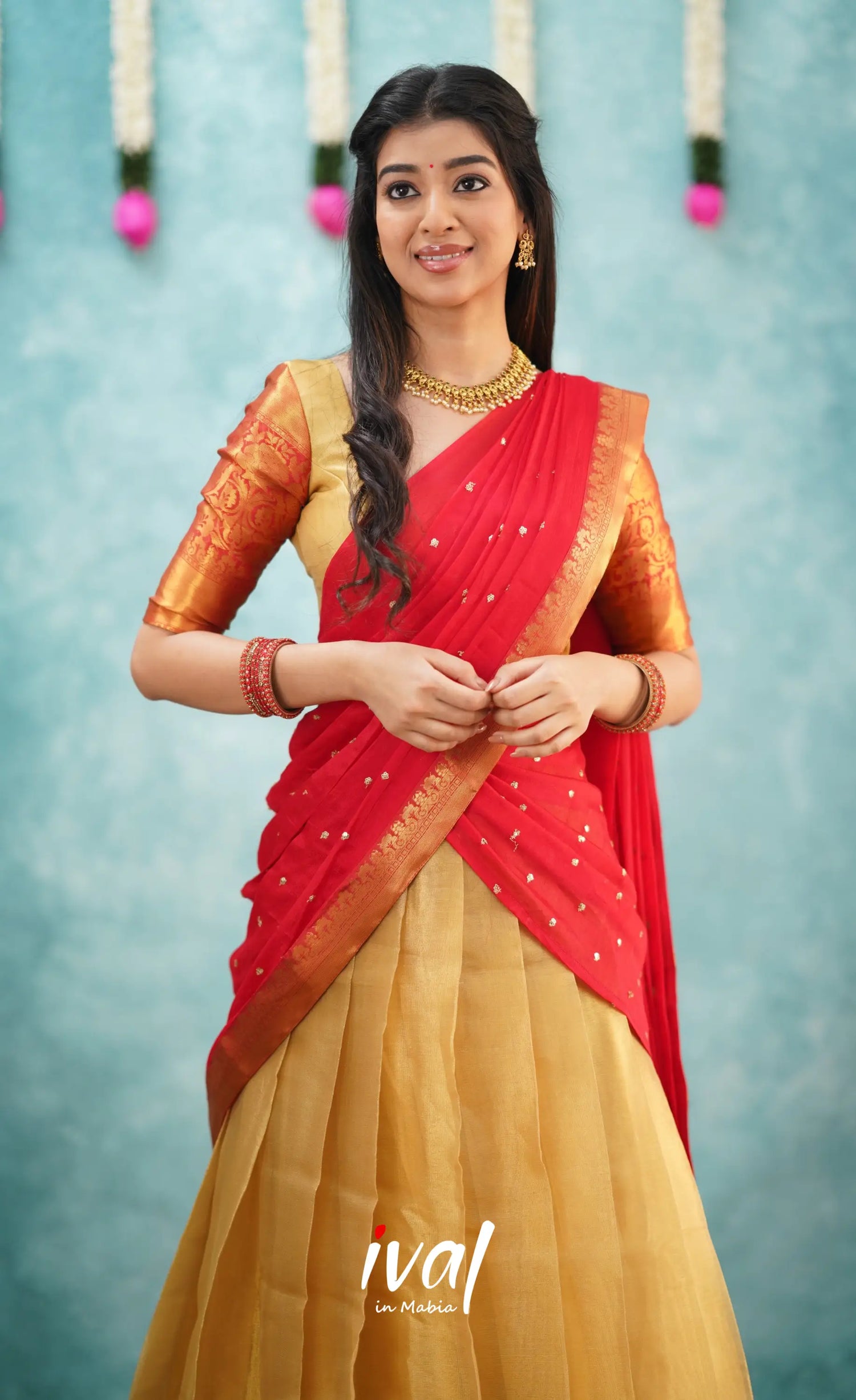 Izhaiyini Shade Of Red And Gold Tone Organza Halfsaree Half Sarees