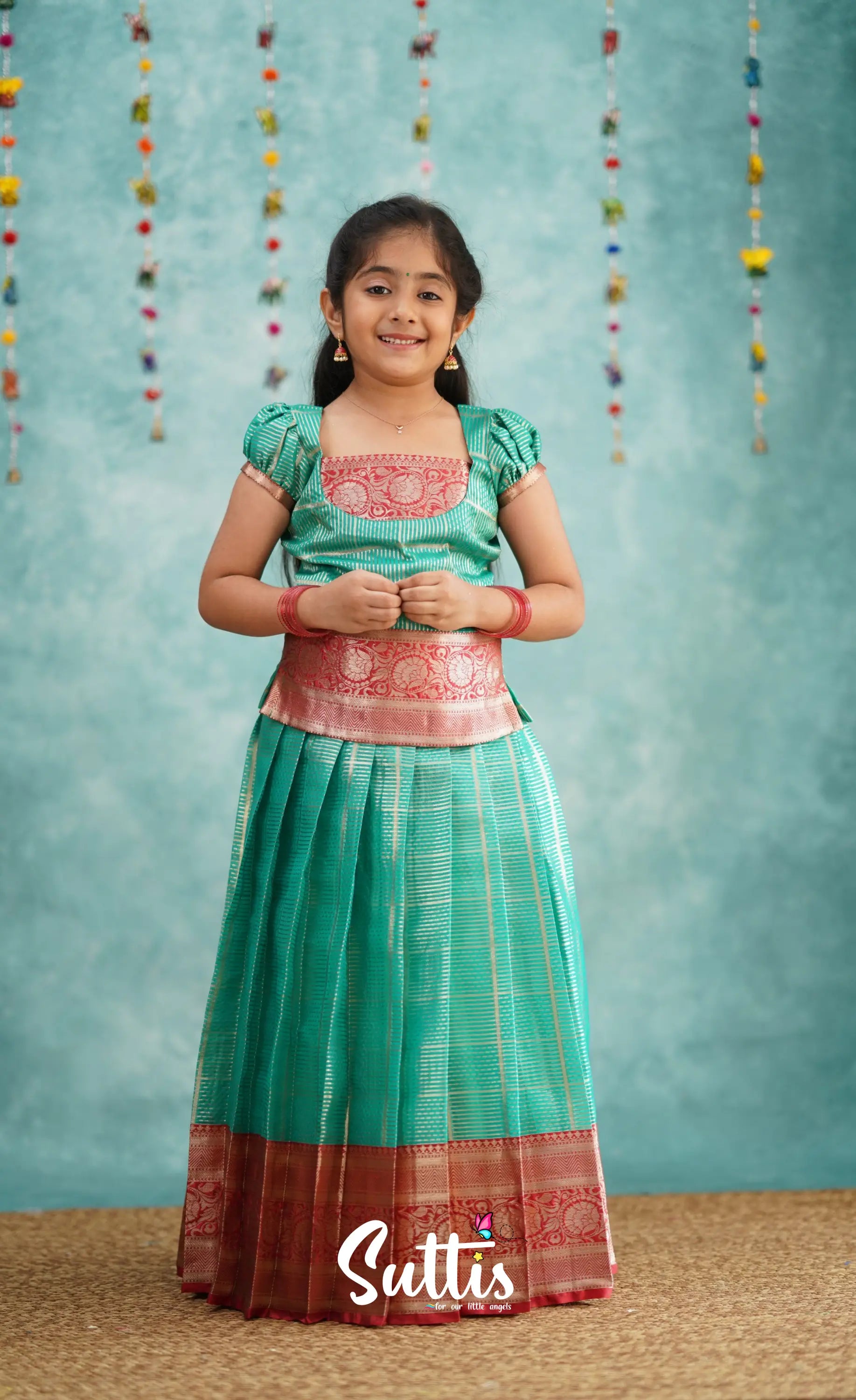 Izhaiyini Teal Shade And Red Tone Organza Pavadai Sattai Kids-Suttis