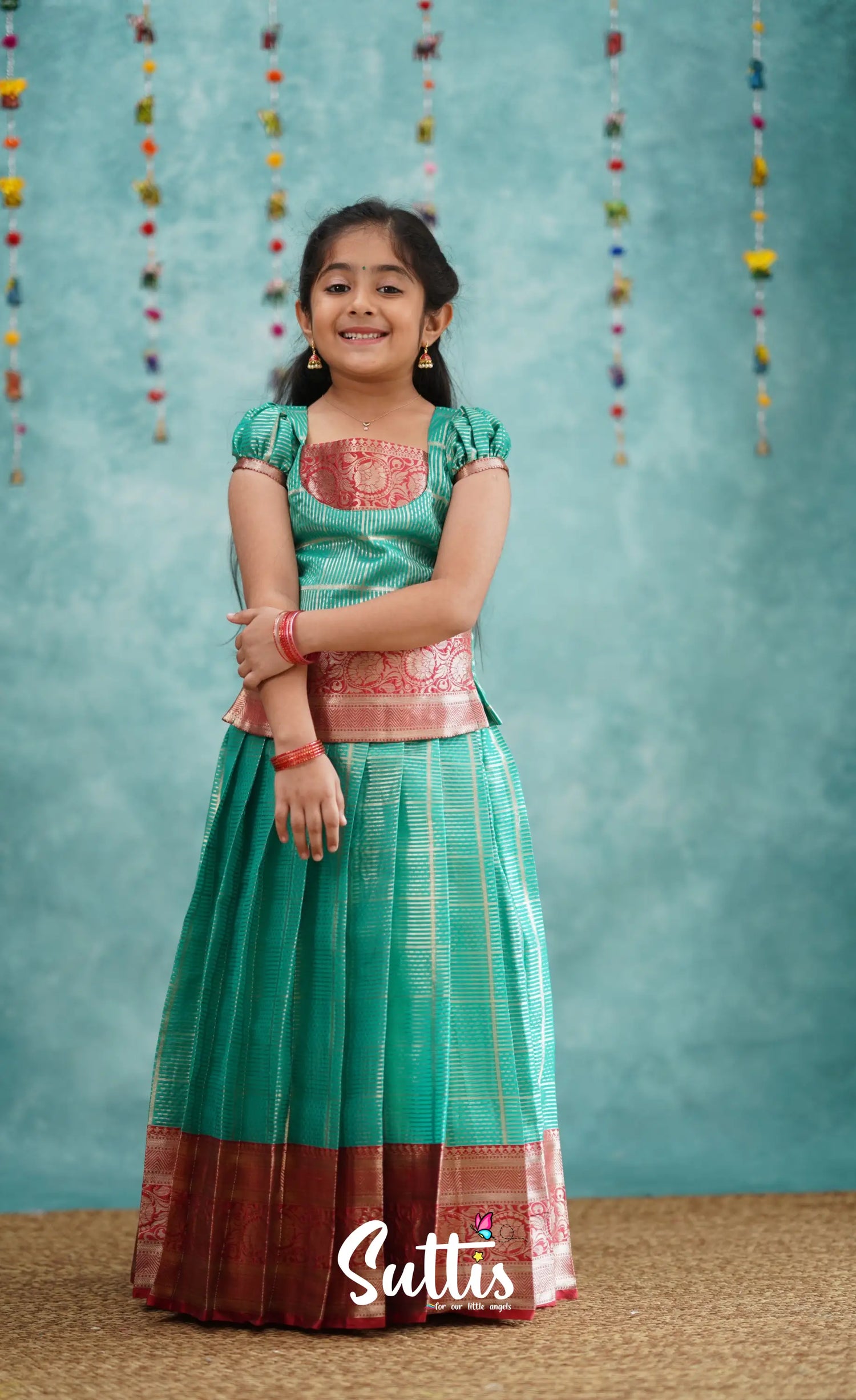 Izhaiyini Teal Shade And Red Tone Organza Pavadai Sattai Kids-Suttis