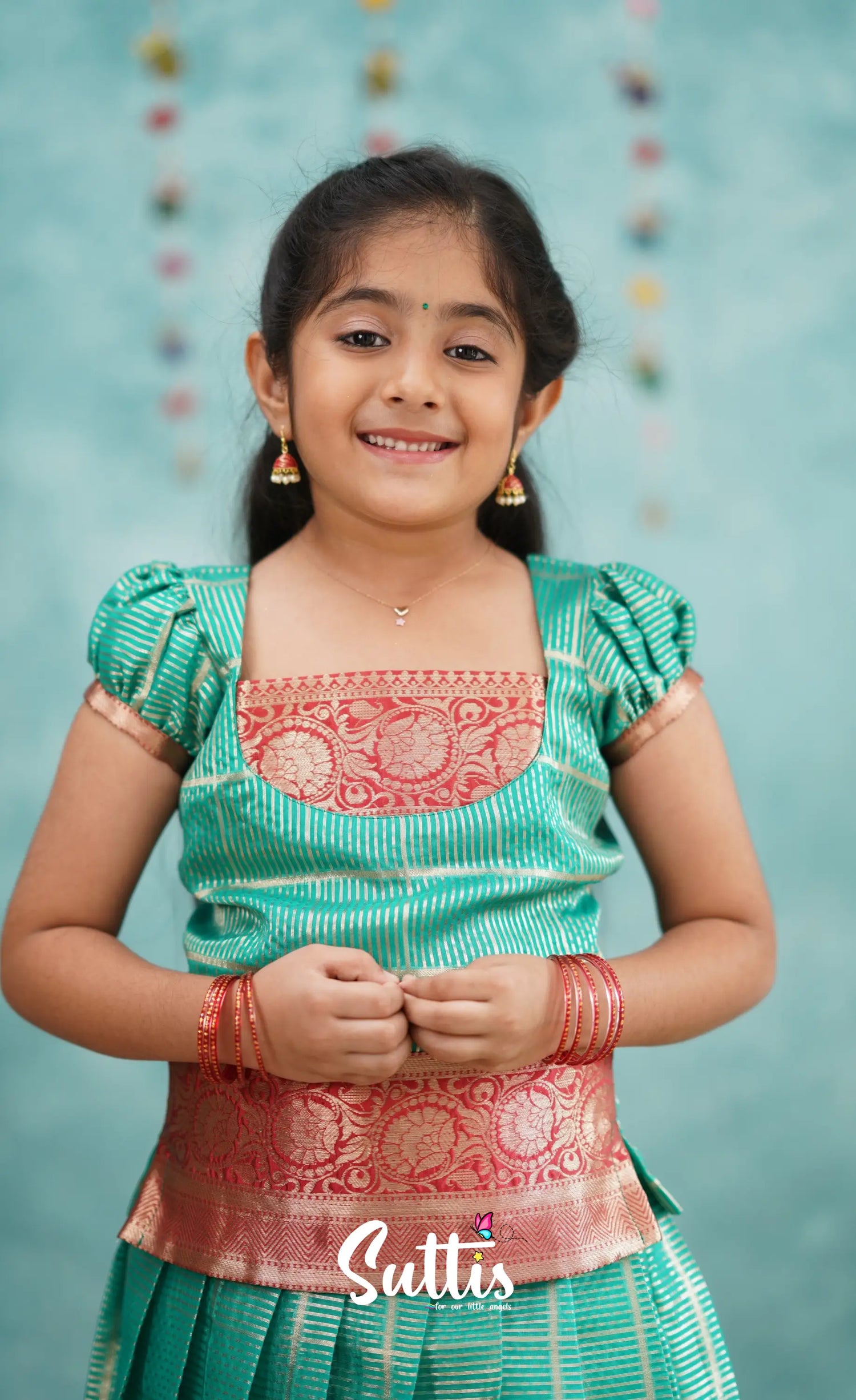 Izhaiyini Teal Shade And Red Tone Organza Pavadai Sattai Kids-Suttis