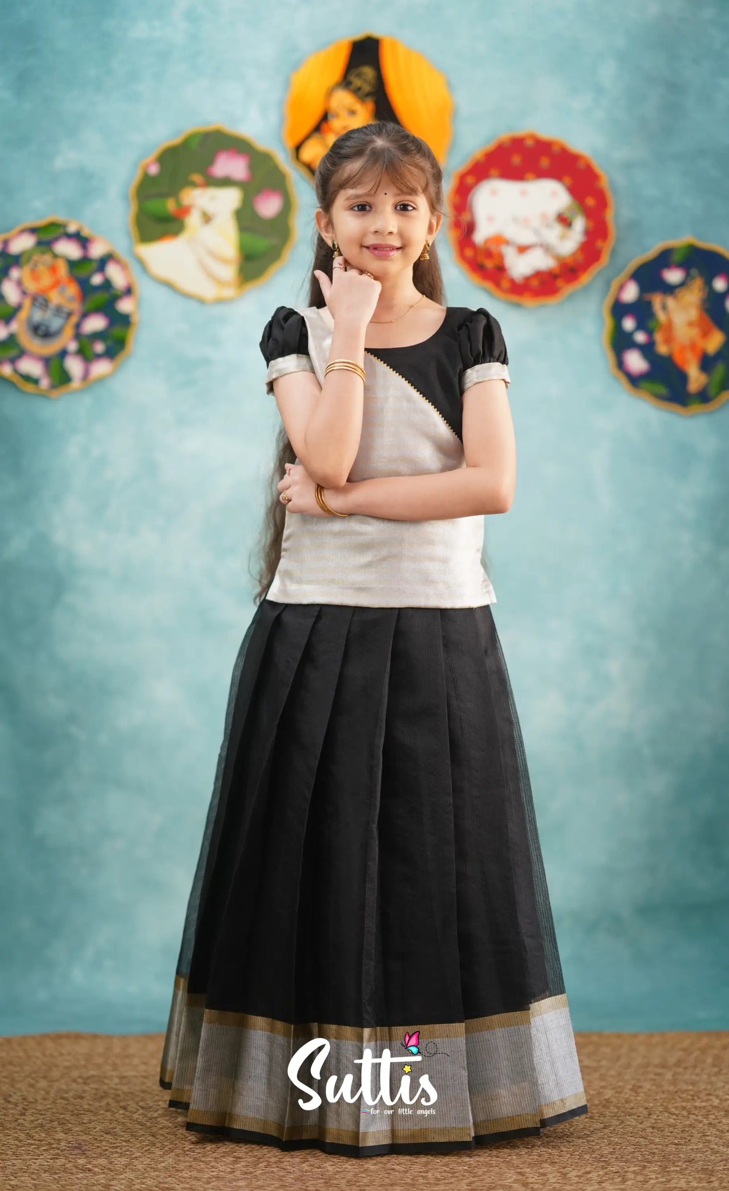 Izhaiyini Tone of Black and Silver Tissue Organza Pavadai Sattai