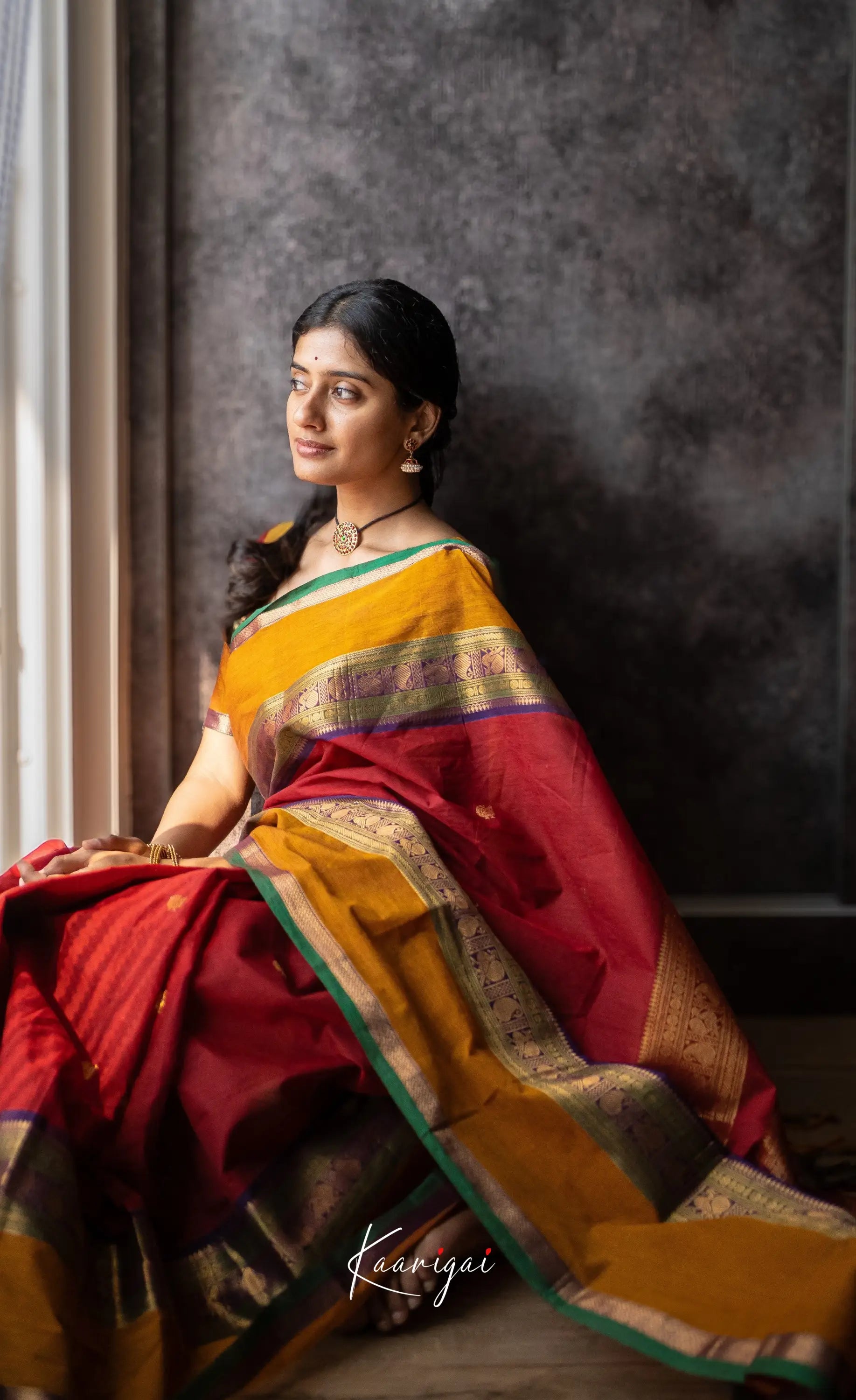 Kamakshi Maroon Tone And Mustard Shade Sarees