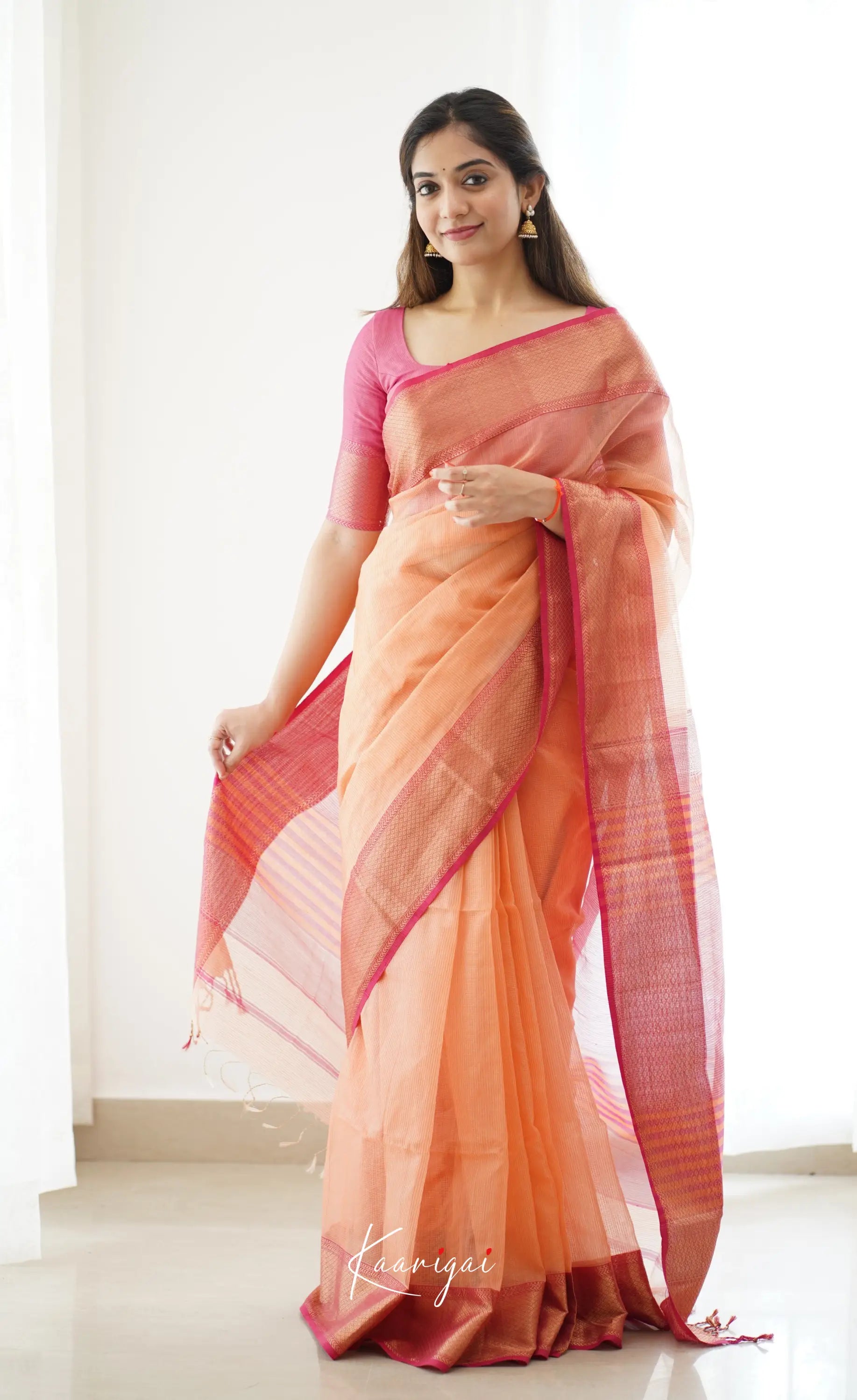 Maanvi- Light Orange Maheswari Silk Cotton Halfsaree Sarees