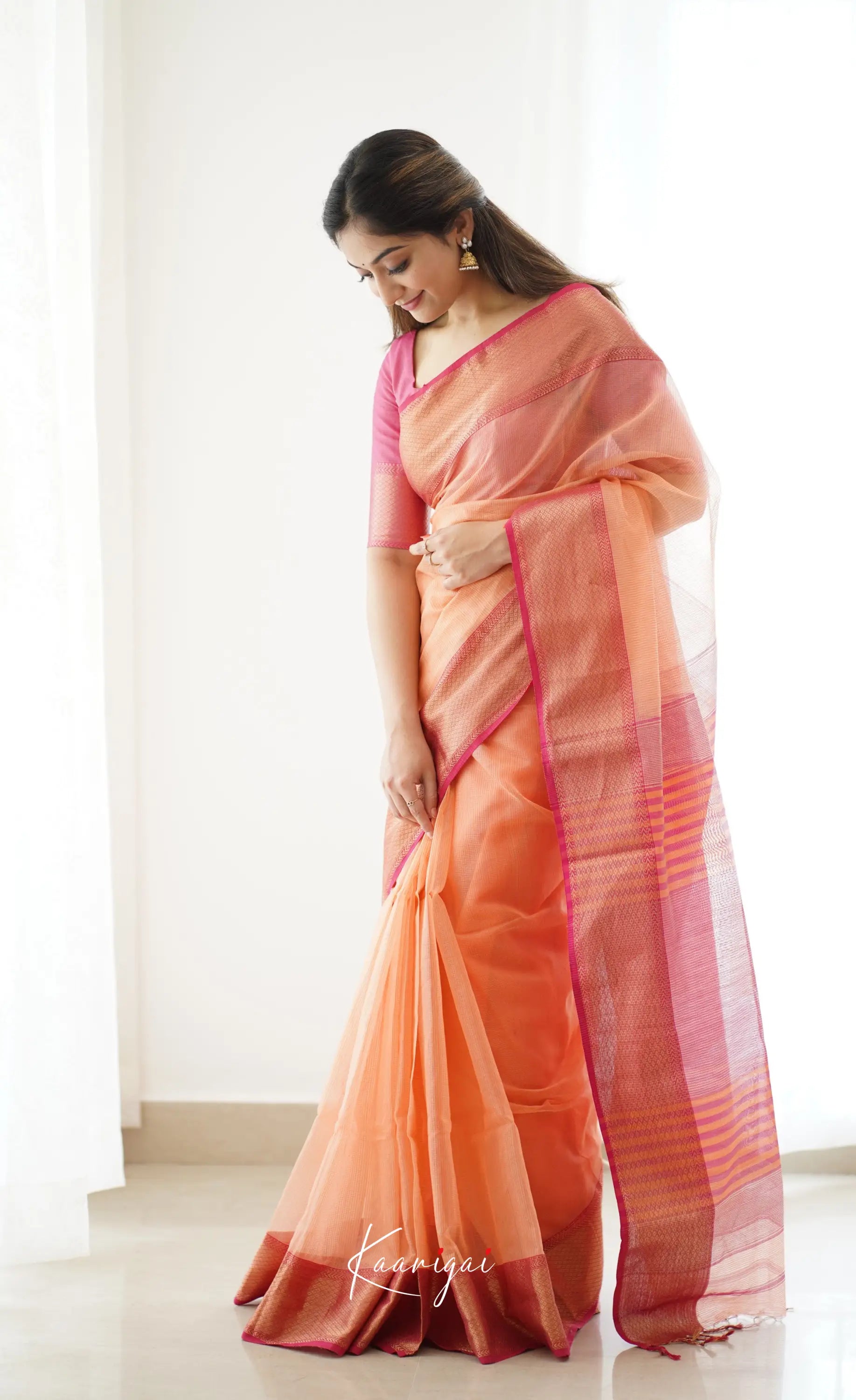 Maanvi- Light Orange Maheswari Silk Cotton Halfsaree Sarees