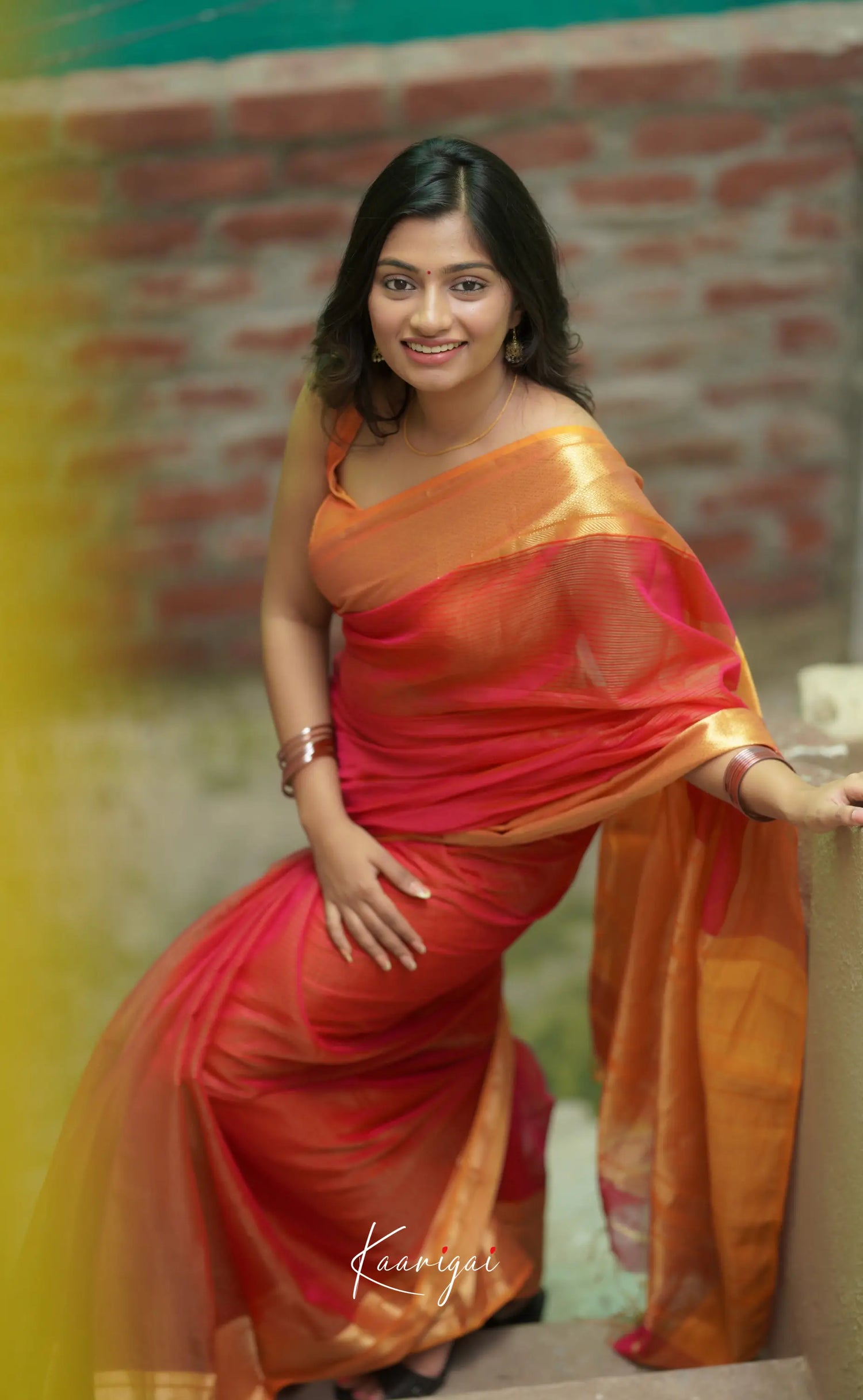 Maanvi - Light Pink Shade And Orange Tone Sarees