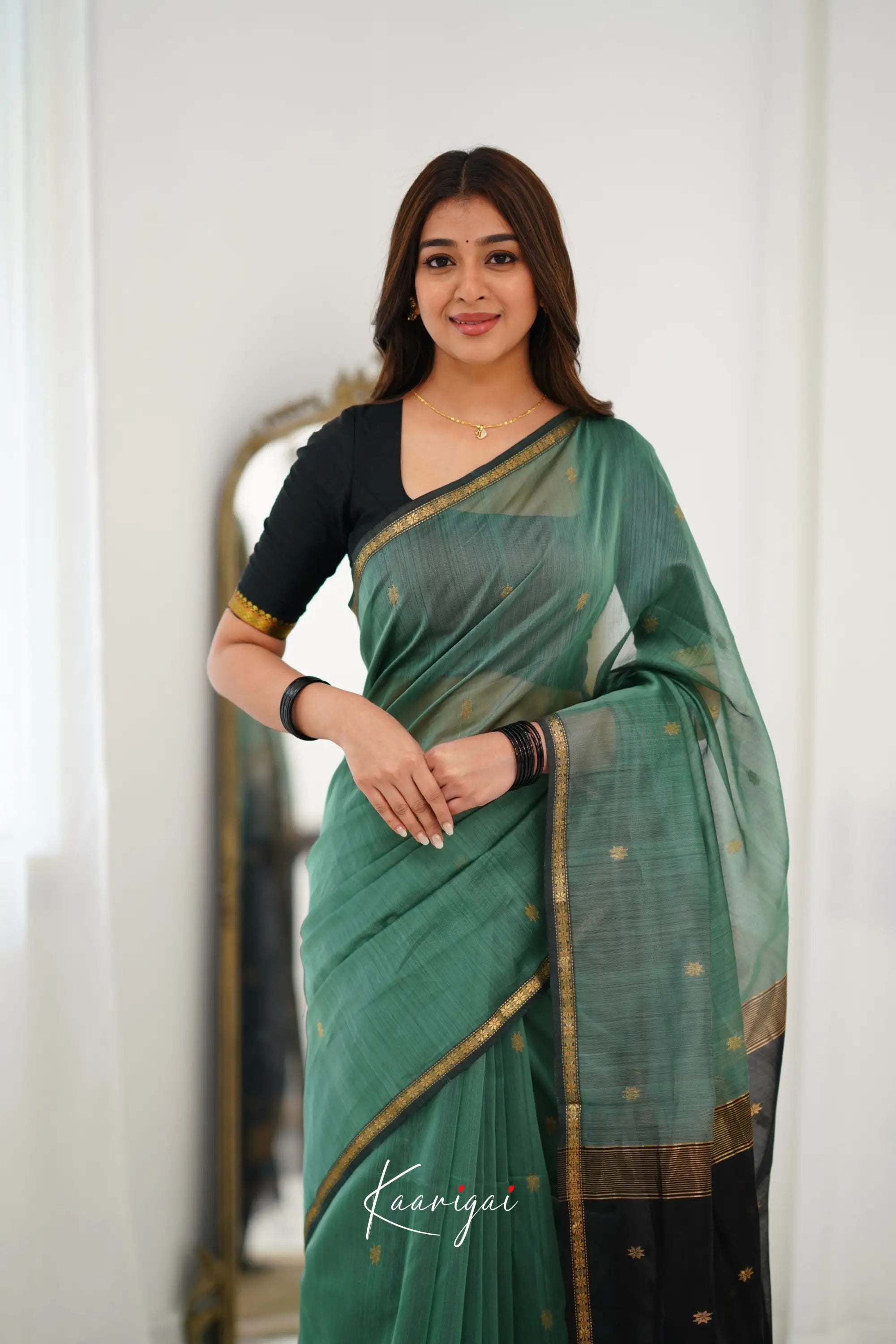 Maanvi Maheswari Silk Cotton Saree - Dull Teal Green And Black Sarees