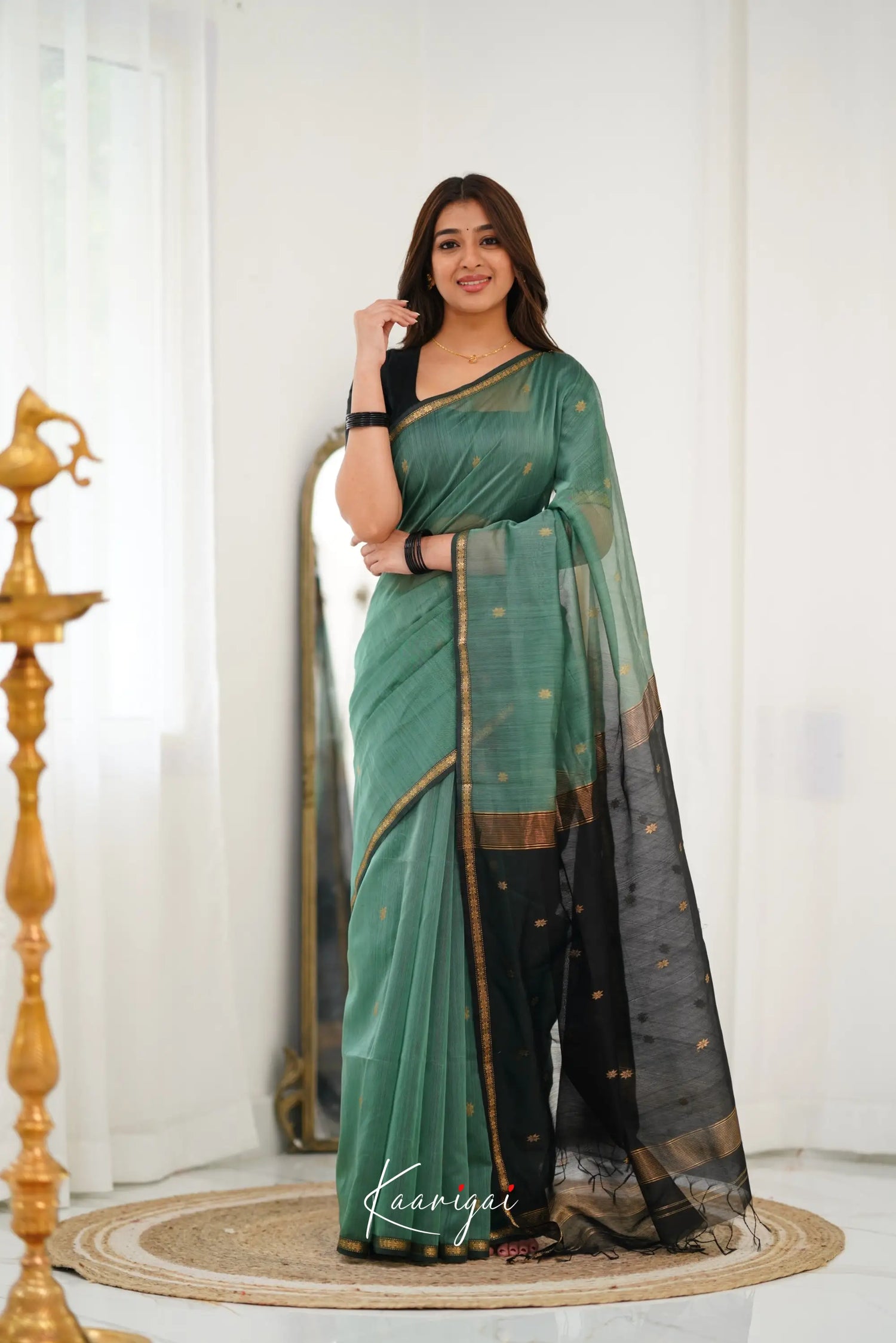 Maanvi Maheswari Silk Cotton Saree - Dull Teal Green And Black Sarees