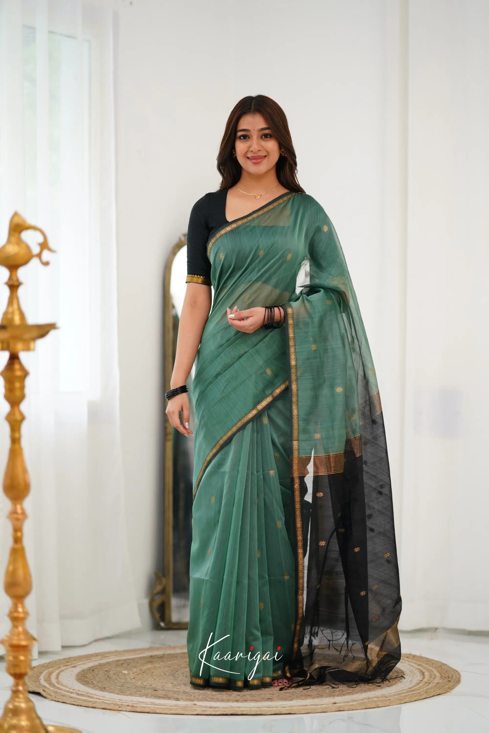 Maanvi Maheswari Silk Cotton Saree Dull Teal Green and Black