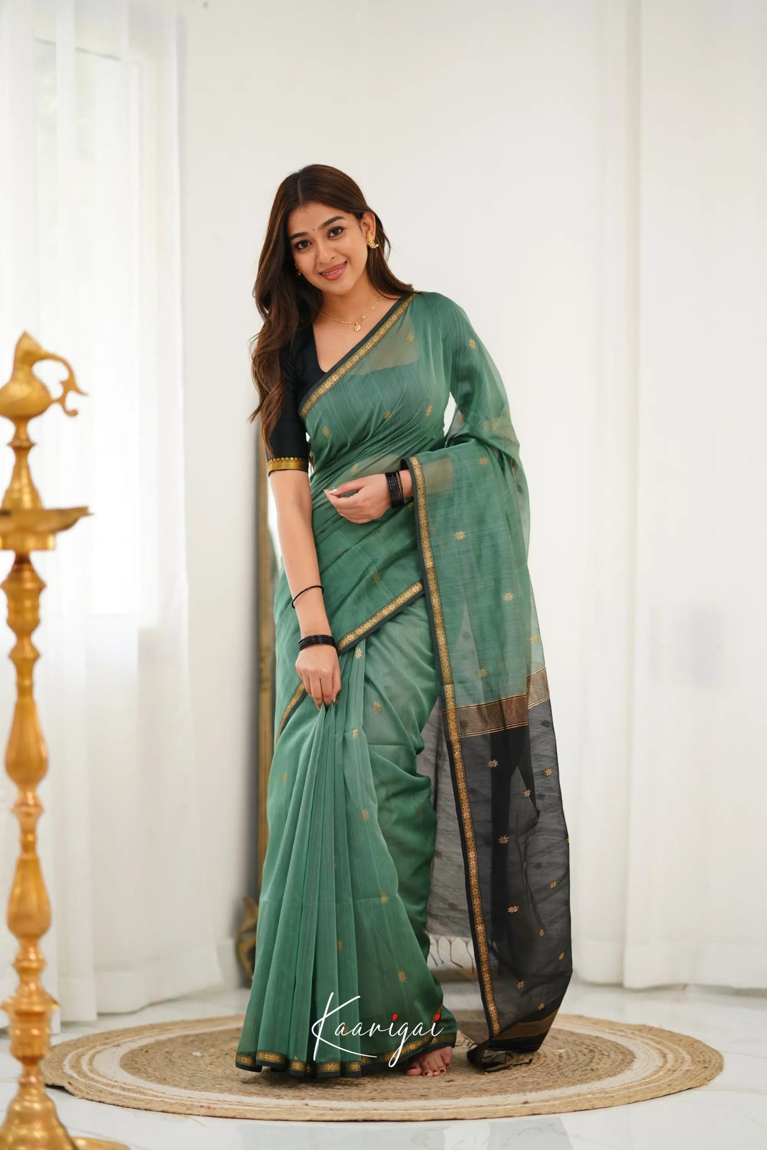 Maanvi Maheswari Silk Cotton Saree - Dull Teal Green And Black Sarees