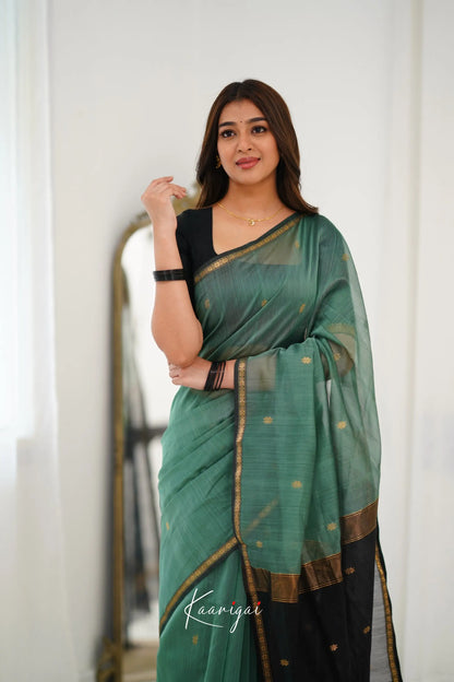 Maanvi Maheswari Silk Cotton Saree - Dull Teal Green And Black Sarees