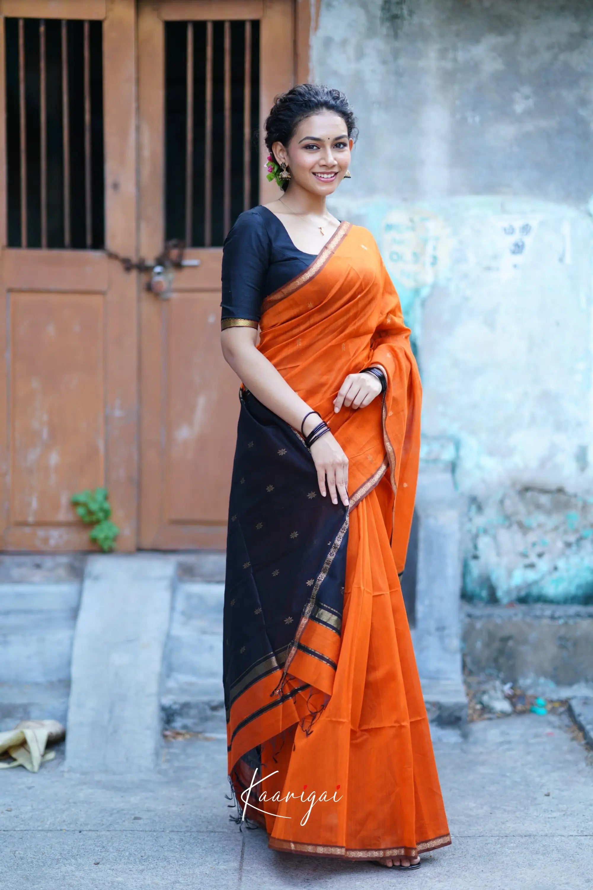 Maanvi Maheswari Silk Cotton Saree - Orange And Black Sarees