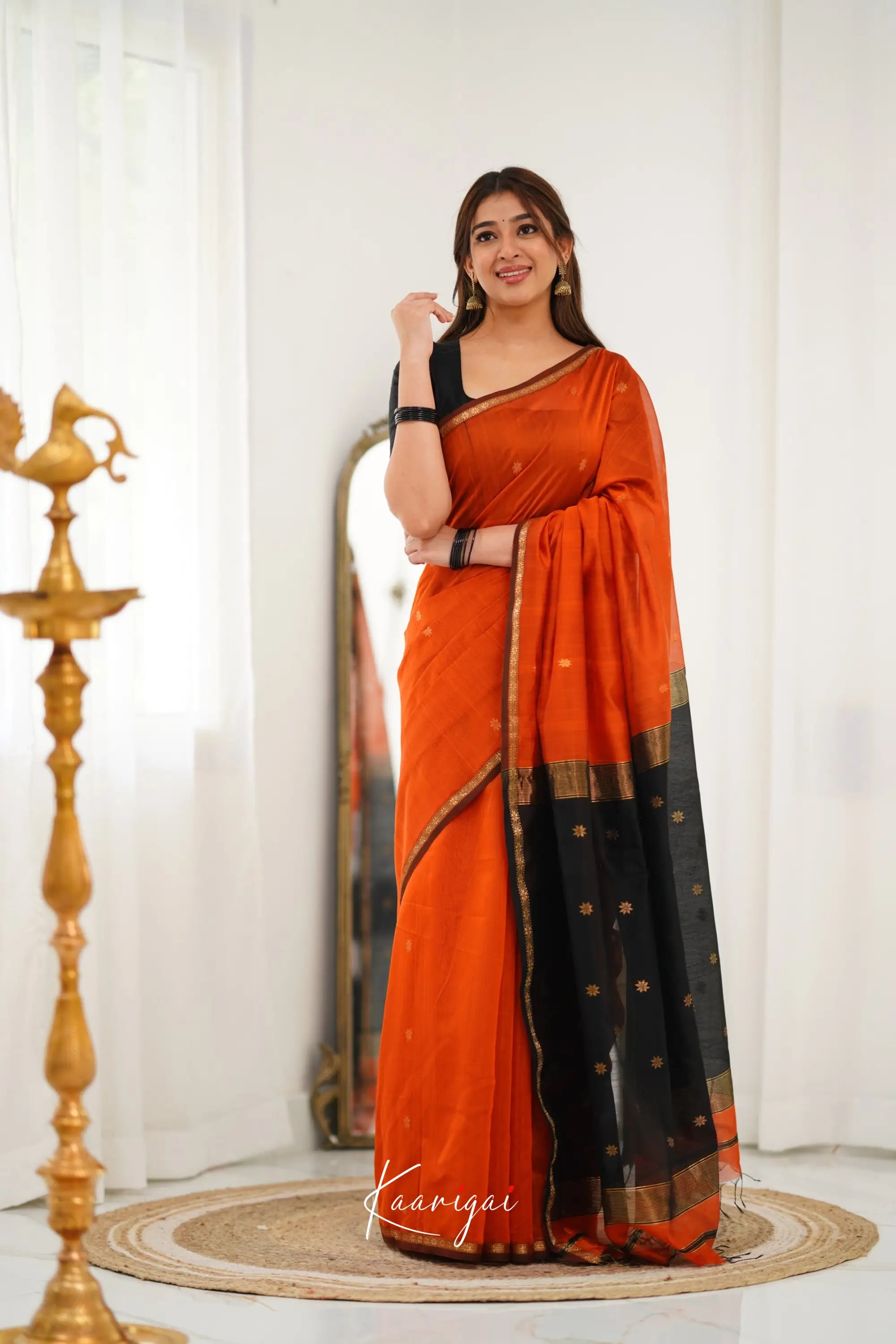 Maanvi Maheswari Silk Cotton Saree - Orange And Black Sarees