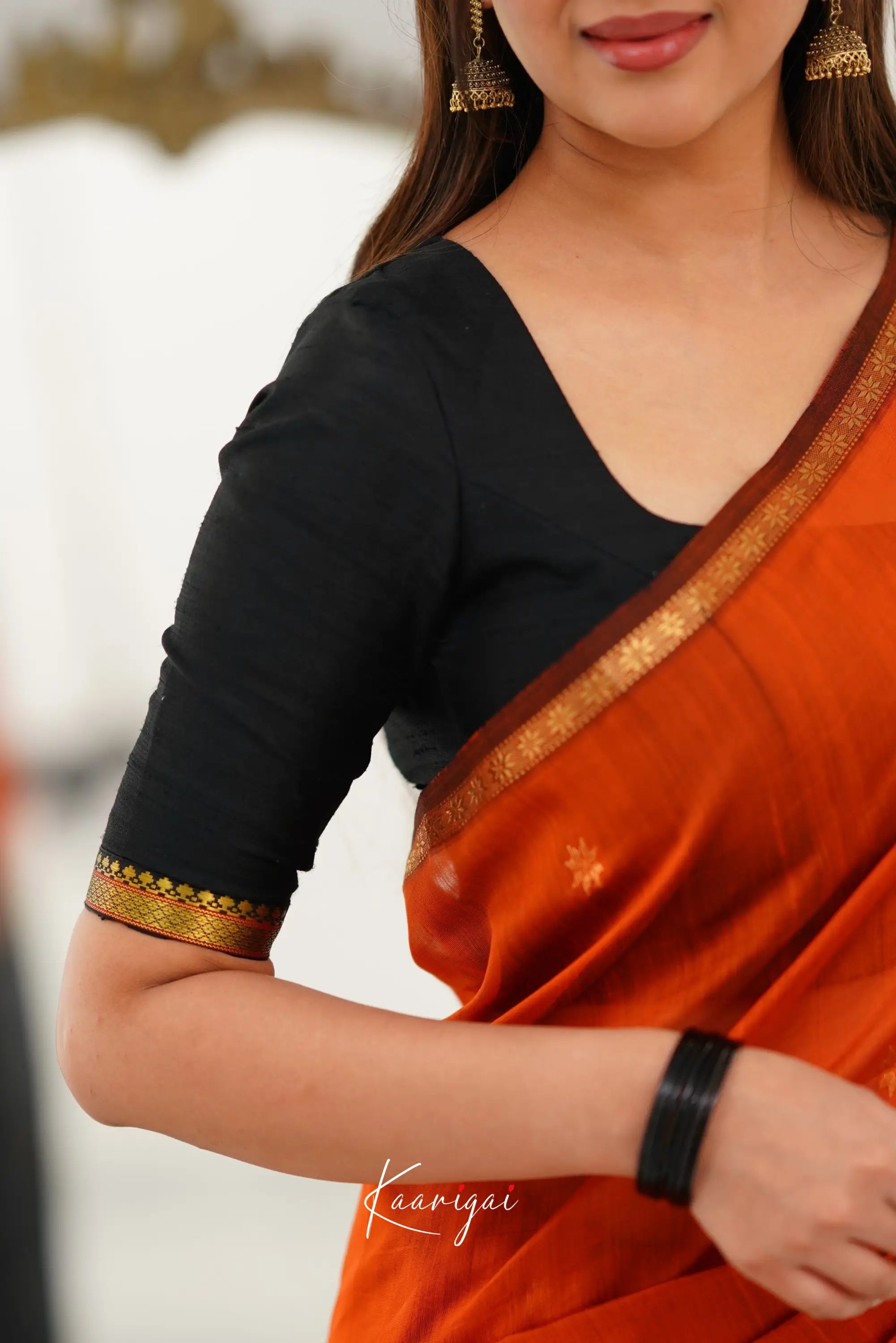 Maanvi Maheswari Silk Cotton Saree - Orange And Black Sarees