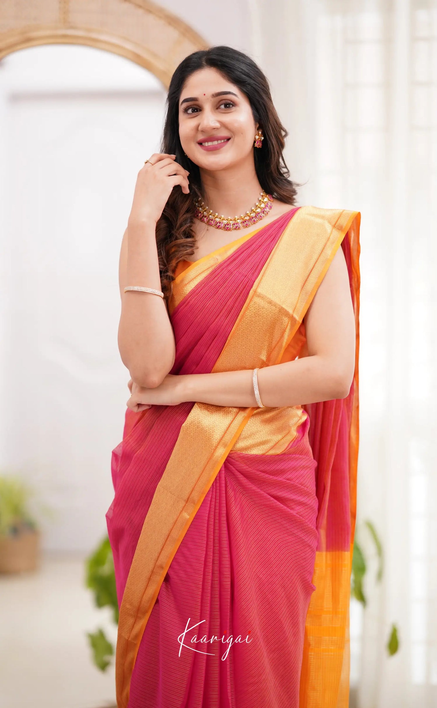 Maanvi- Pinkish Shade And Orange Tone Sarees