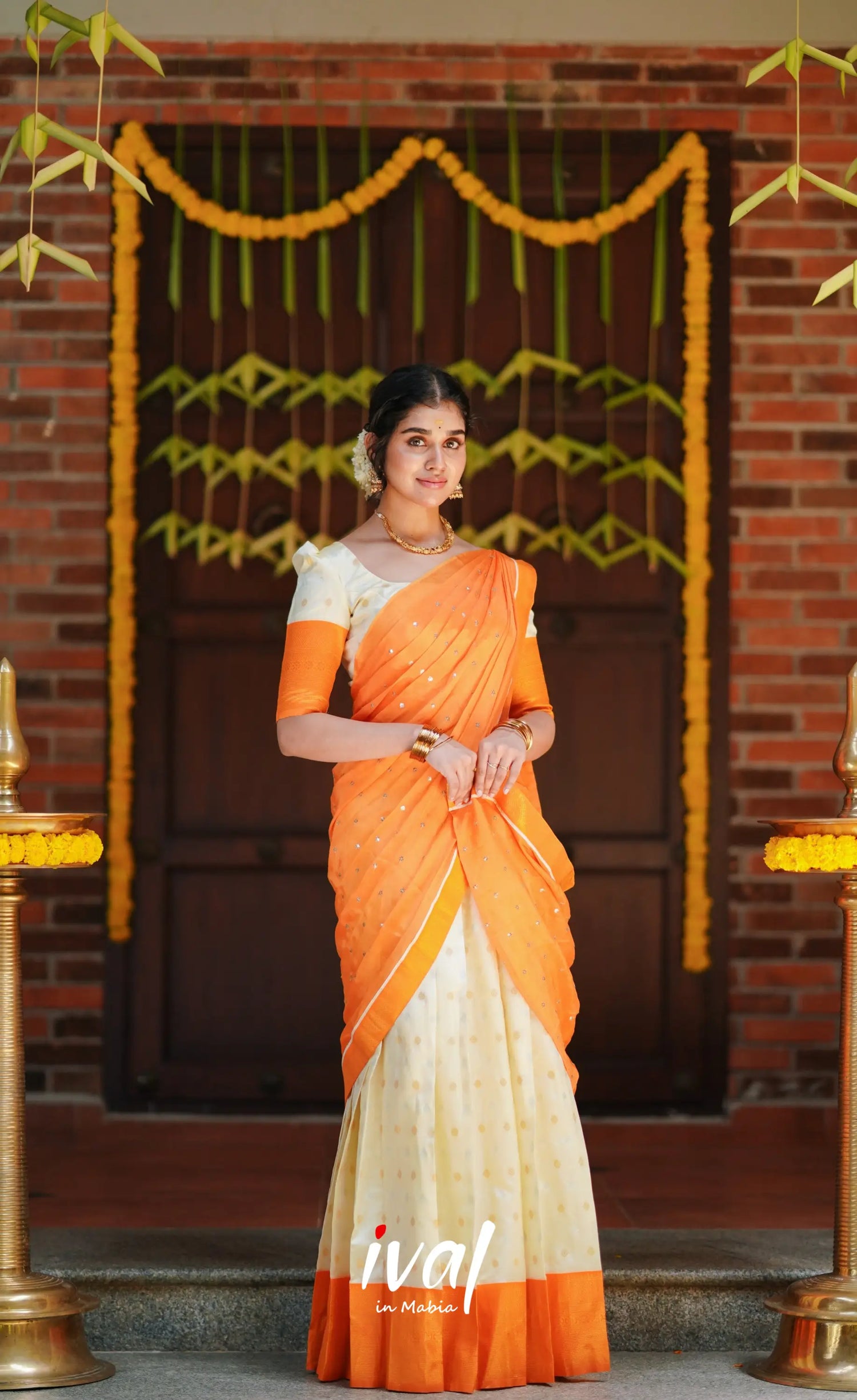 Padmakshi Cream and Mango Orange Semi Silk Halfsaree Ivalinmabia