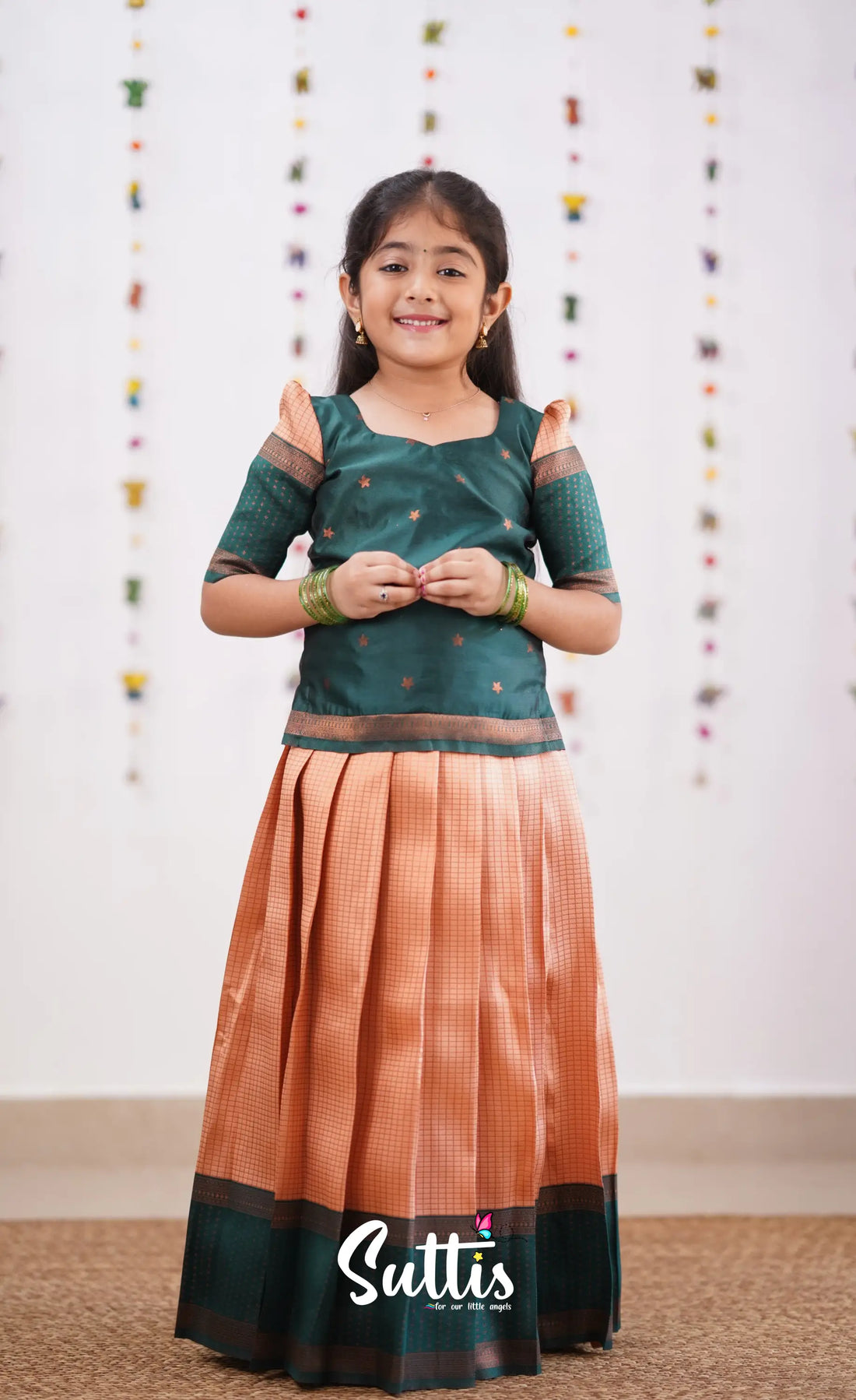 Padmakshi - Light Salmon Orange Shade And Green Tone Blended Silk Pavadai Sattai Kids-Suttis