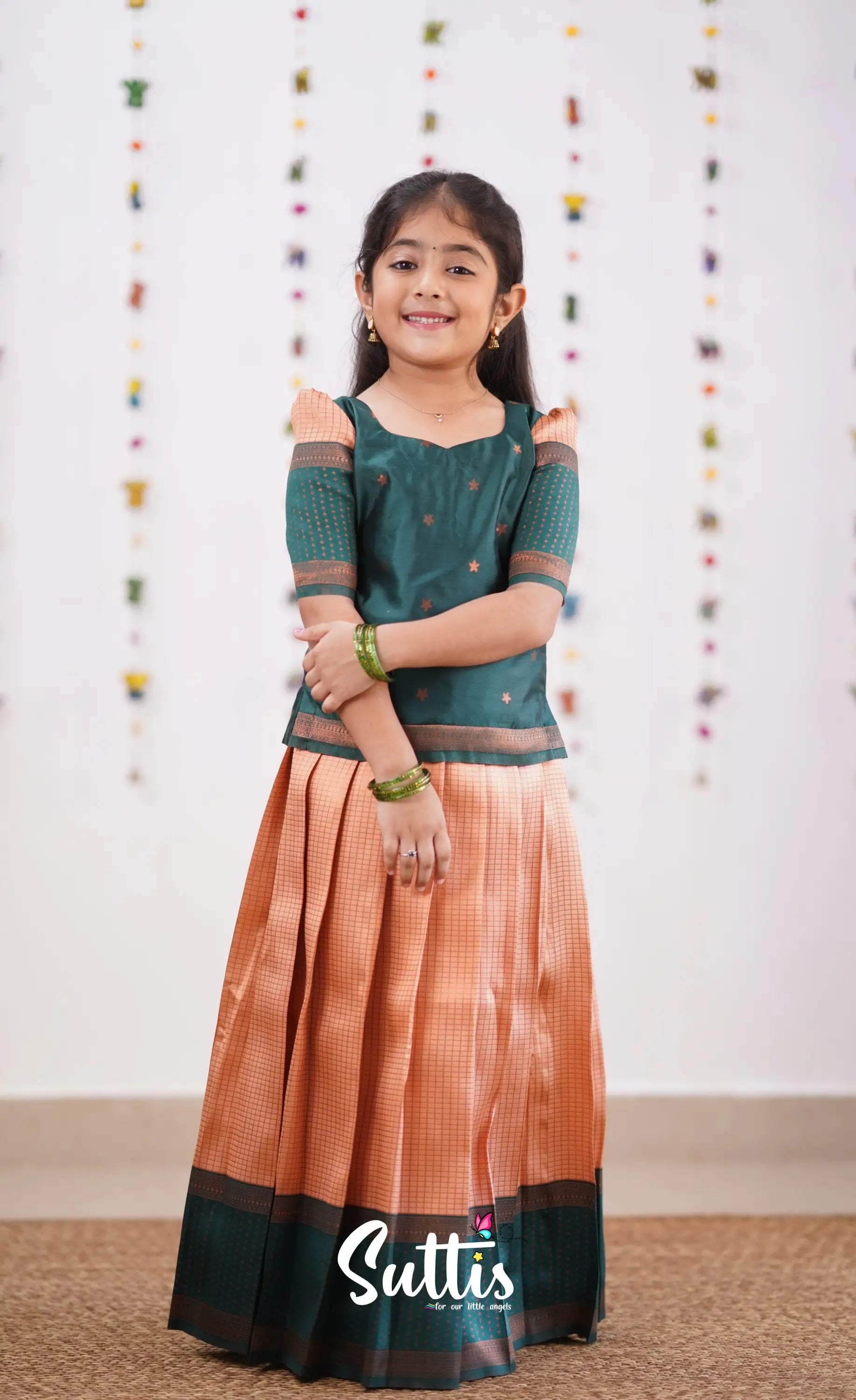 Padmakshi - Light Salmon Orange Shade And Green Tone Blended Silk Pavadai Sattai Kids-Suttis