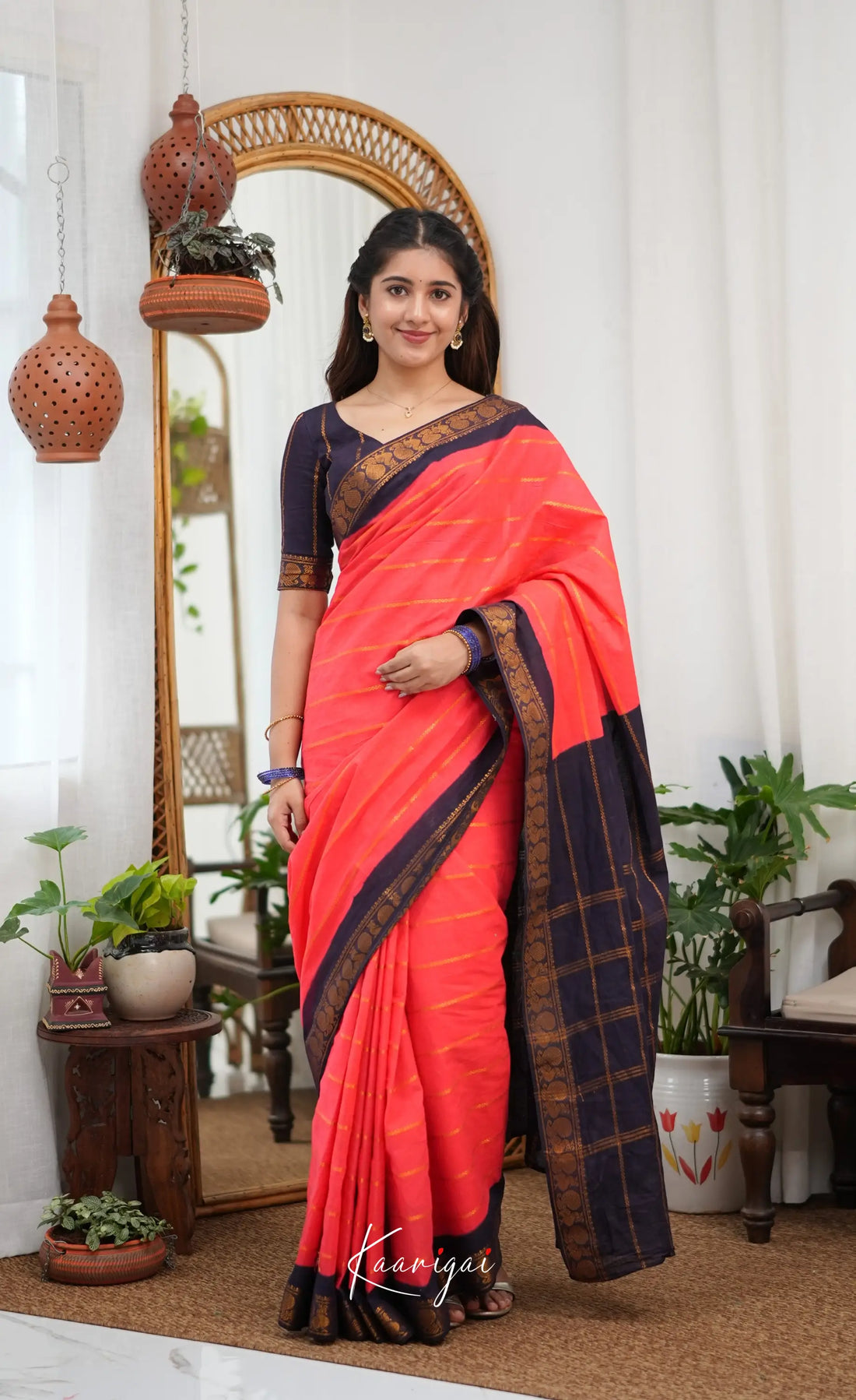 Saaral - Coral Orangish Pink and Dark Navy Blue Sungudi Saree - Sarees