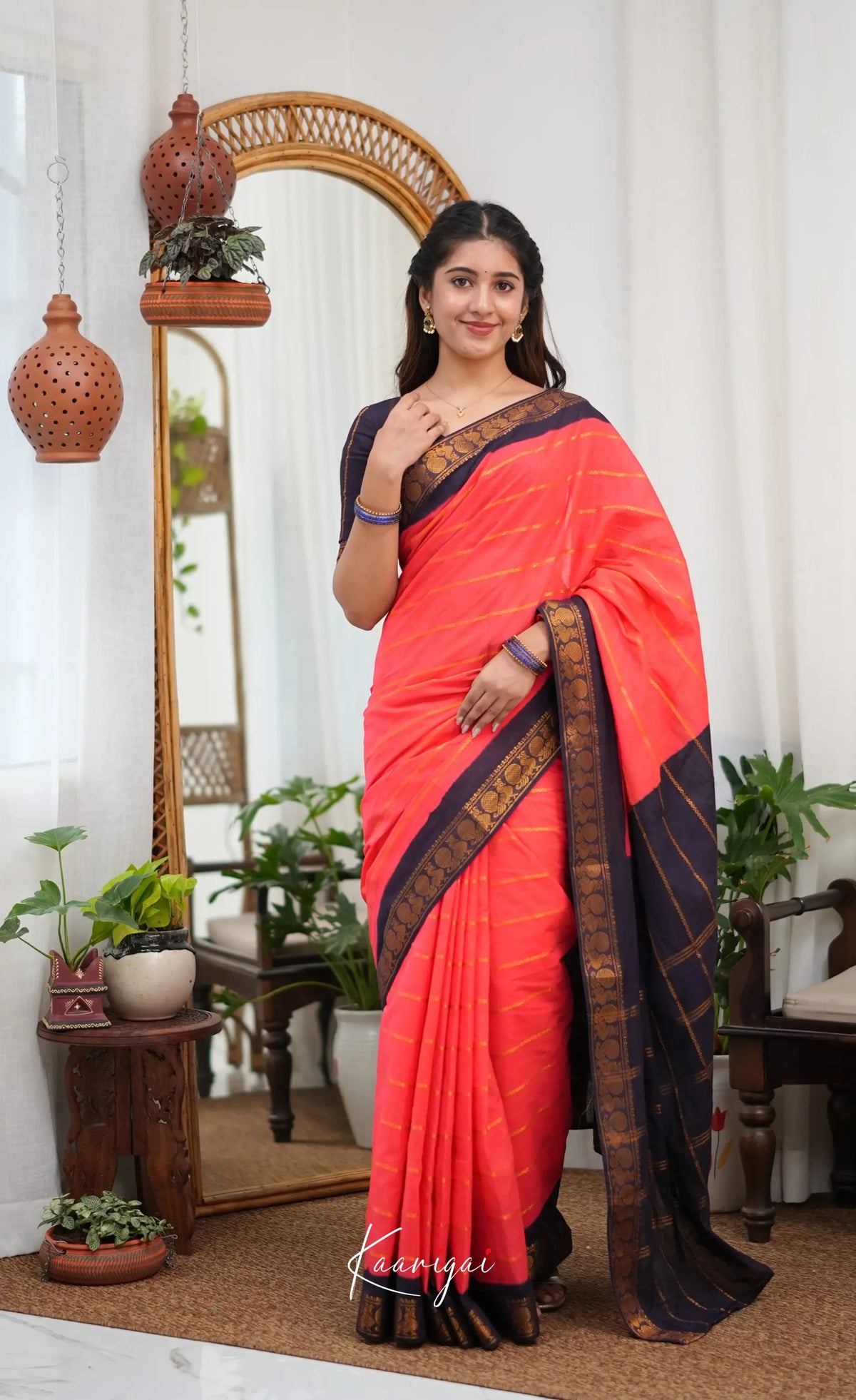 Saaral - Coral Orangish Pink and Dark Navy Blue Sungudi Saree - Sarees