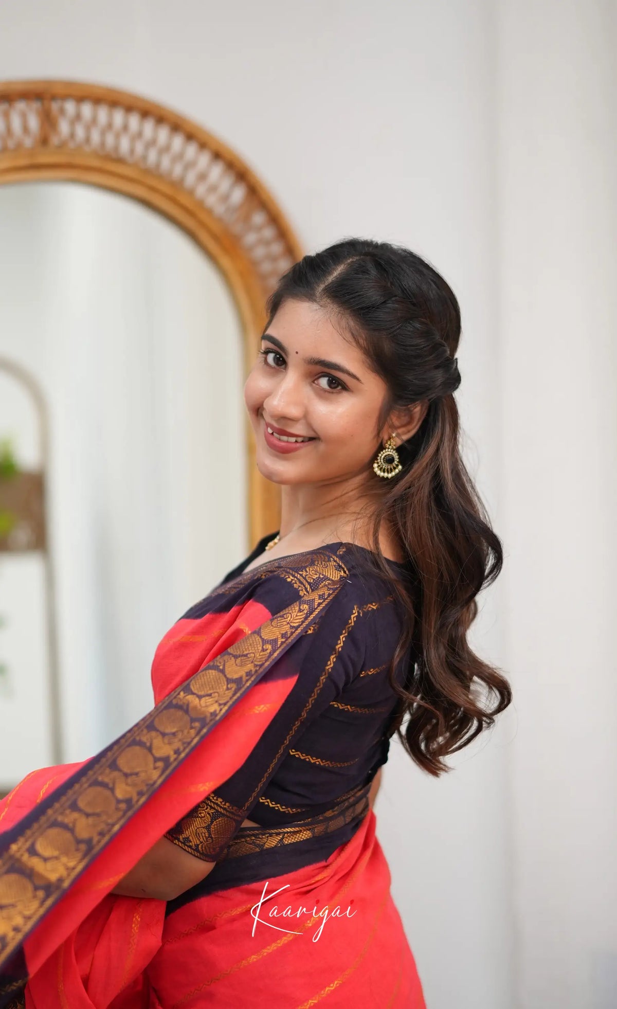 Saaral - Coral Orangish Pink and Dark Navy Blue Sungudi Saree - Sarees