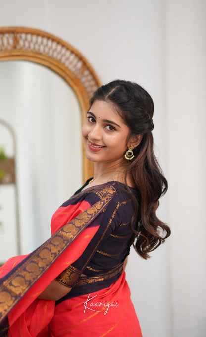 Saaral - Coral Orangish Pink and Dark Navy Blue Sungudi Saree - Sarees