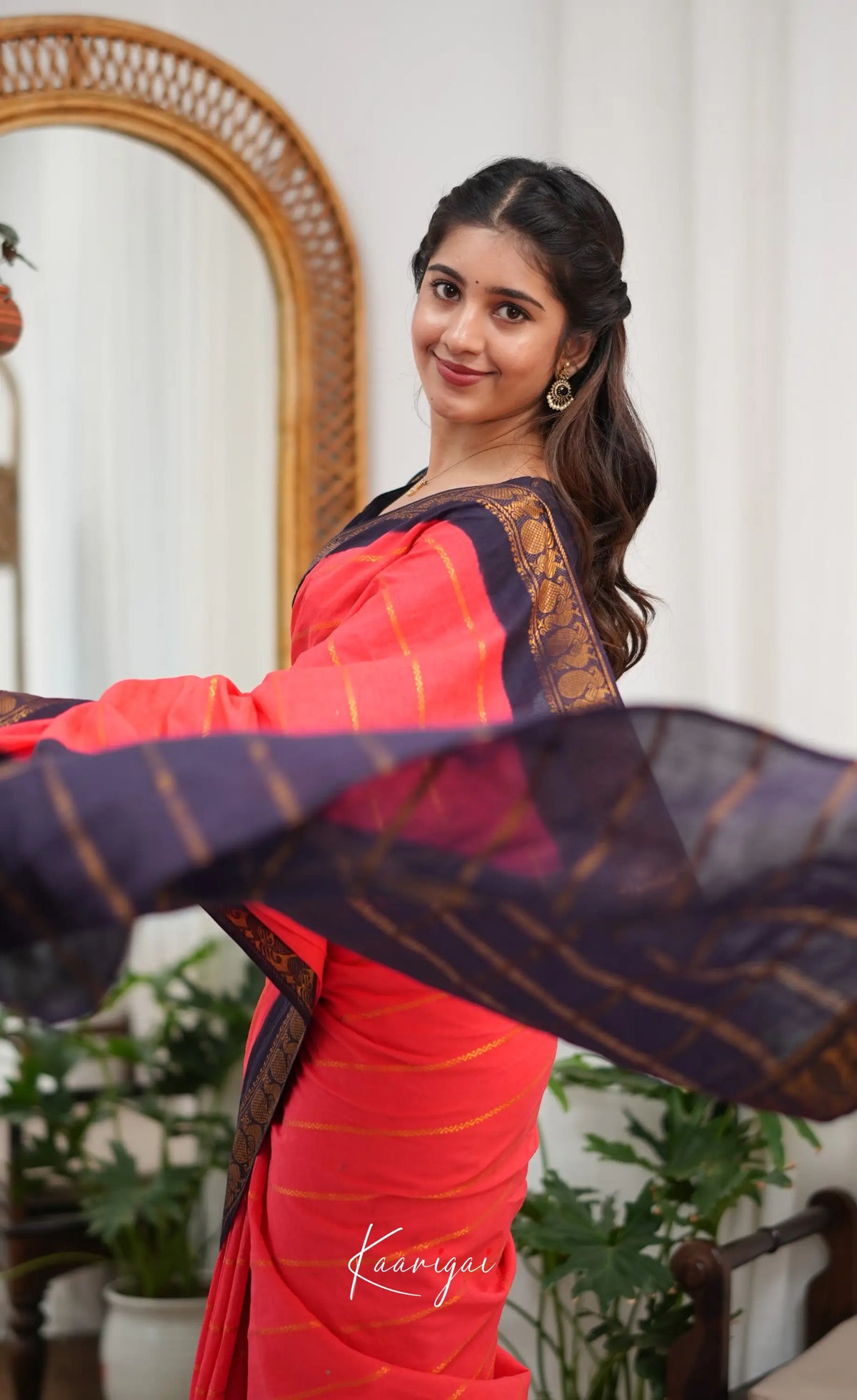 Saaral - Coral Orangish Pink and Dark Navy Blue Sungudi Saree - Sarees