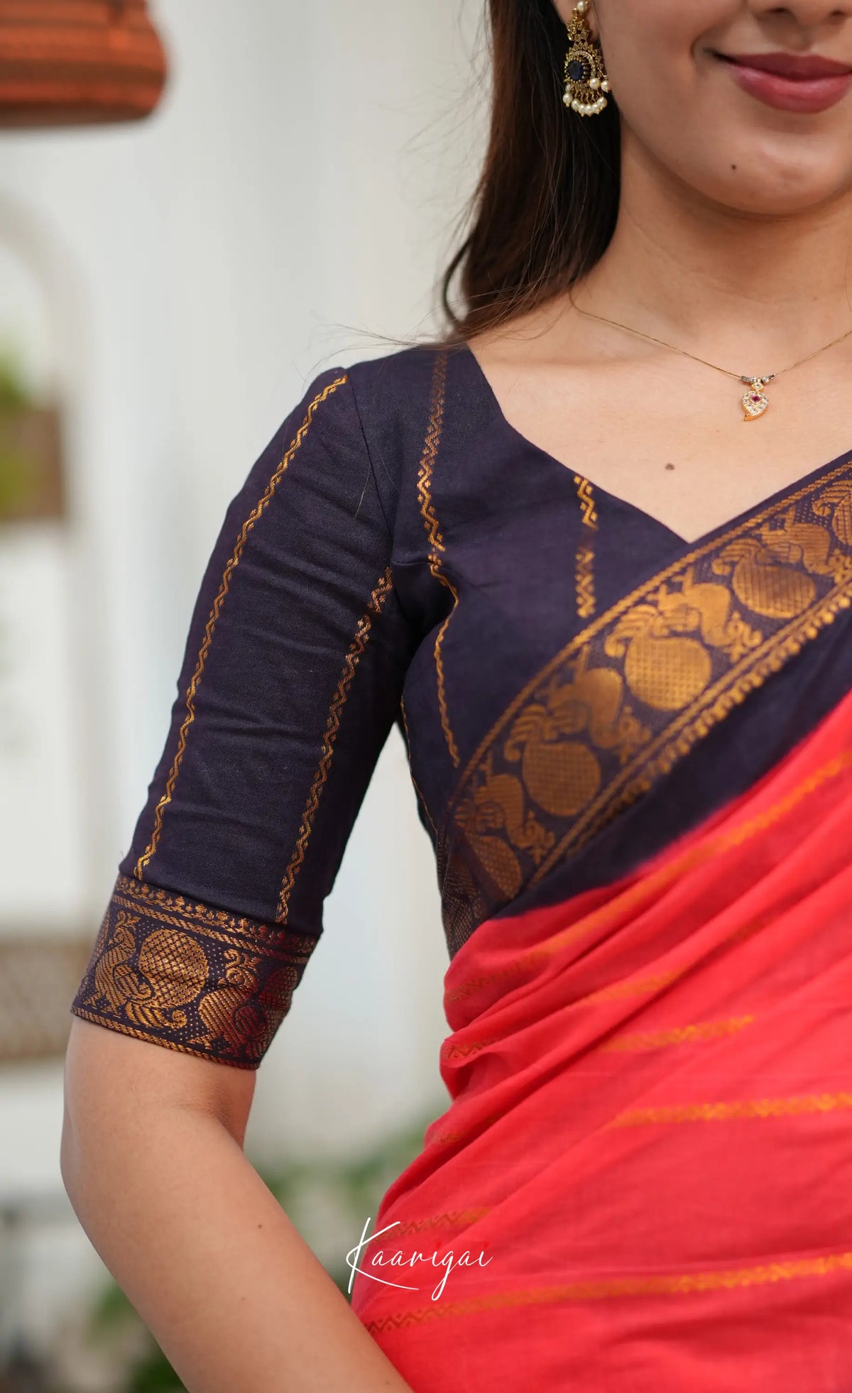 Saaral - Coral Orangish Pink and Dark Navy Blue Sungudi Saree - Sarees