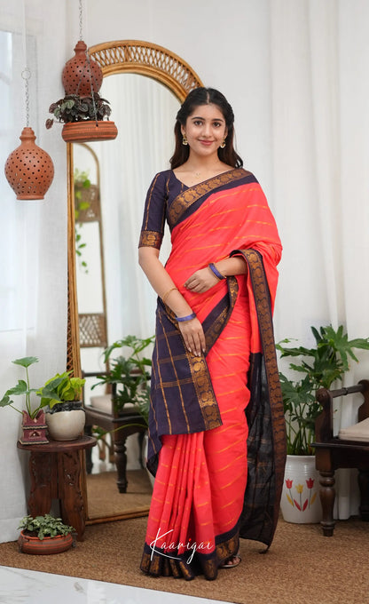 Saaral - Coral Orangish Pink and Dark Navy Blue Sungudi Saree - Sarees