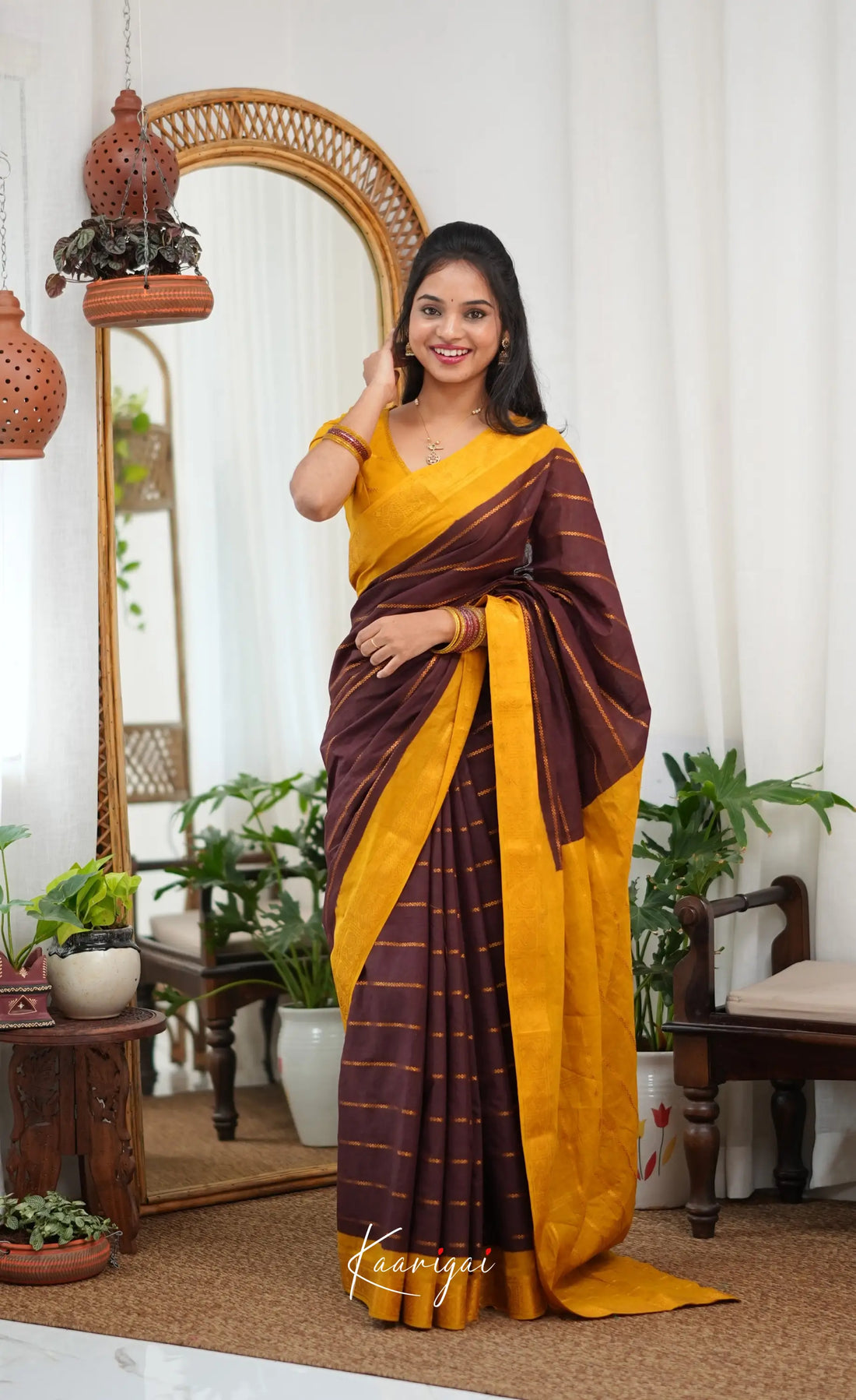 Saaral - Dark brown and Henna yellow Sungudi Saree - Sarees