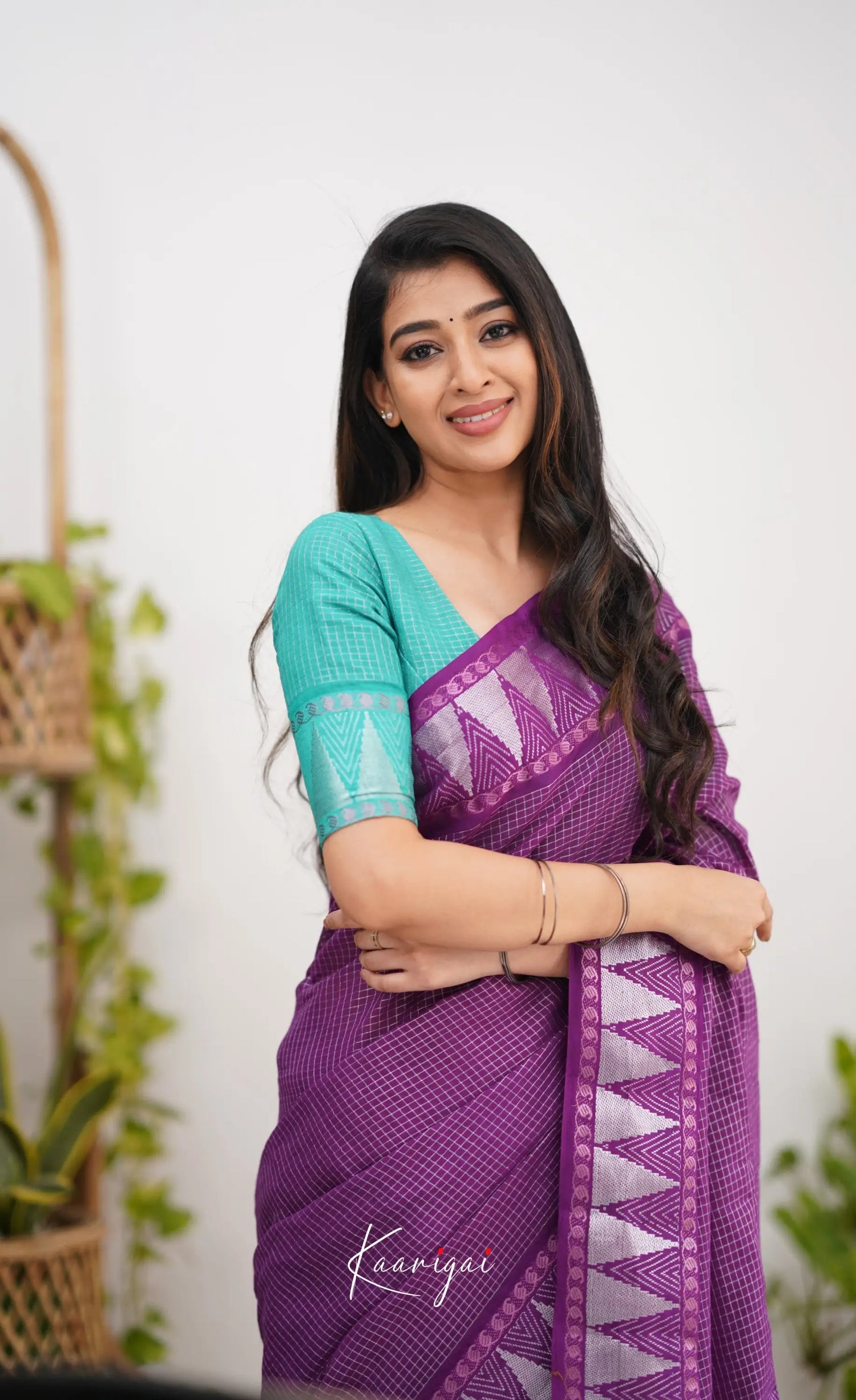 Saaral Dark Purple Shade And Teal Green Tone Sungudi Saree Sarees